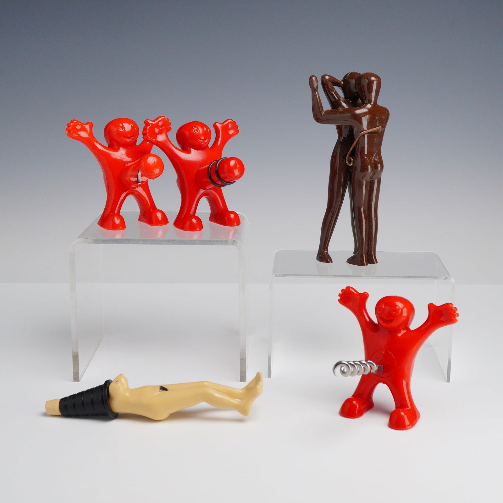 5pc Wine Risque Opener and Corks with Bag Claw Novelty Barware Collection: This 5pc wine risque opener and corks with bag claw collection features an assortment of novelty bar accessories and wine tools manufactured from molded plastic, metal, and rubber. The group includes