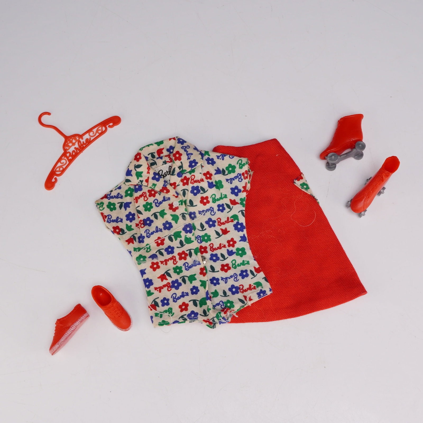 7-Piece Vintage Mattel Barbie Doll Fun at the Fair Outfit #1624 and Accessories: This set is identified as the Fun at the Fair ensemble, model number 1624, manufactured by Mattel for the Barbie doll line in 1965. The group includes a sleeveless cream-colored blouse featuring a