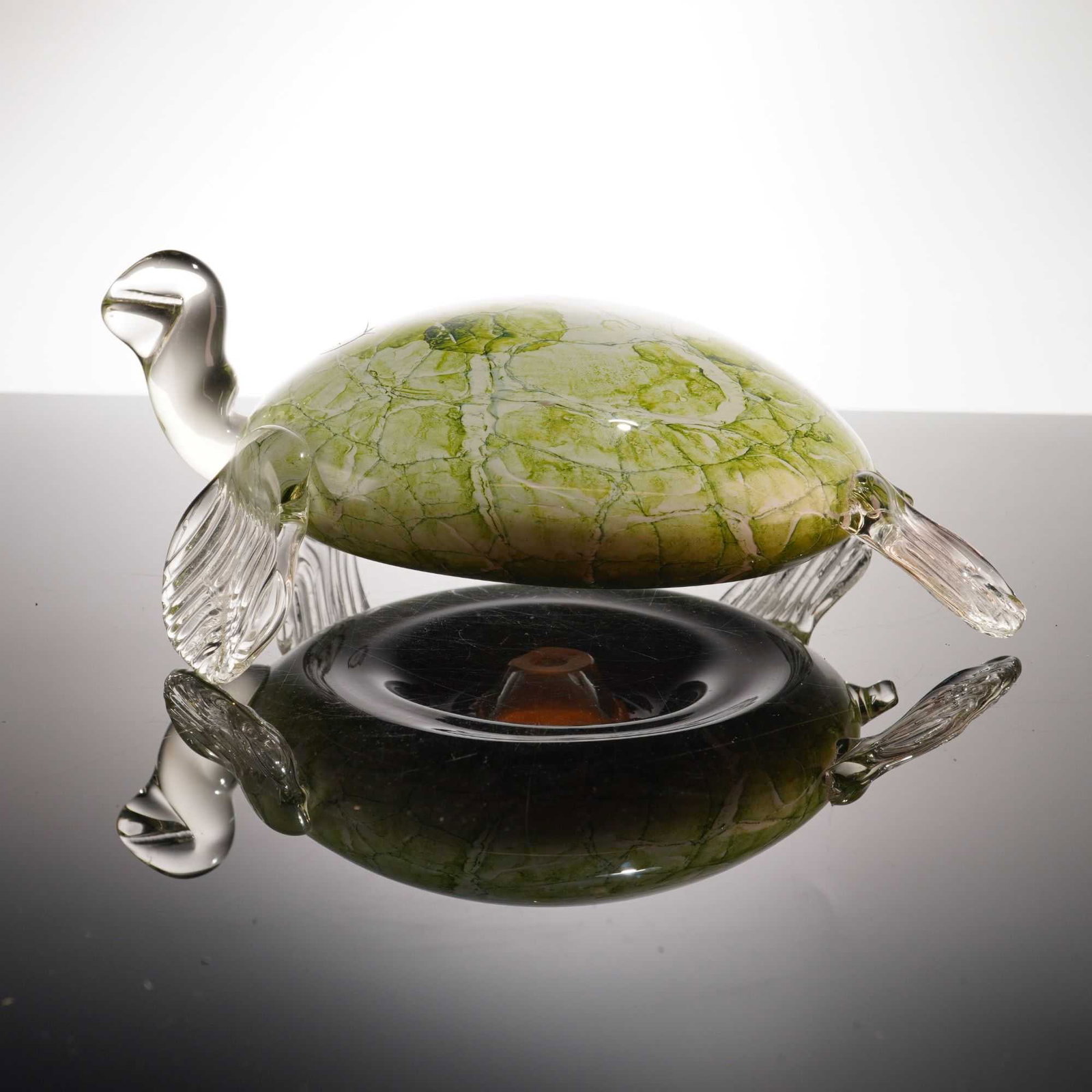 Jozefina Atelier Krosno Art Glass Turtle Sculpture: This hand-blown art glass turtle sculpture is produced by Jozefina Atelier in the Krosno region of Poland. The piece features a large, domed carapace with a mottled green and white internal decoration