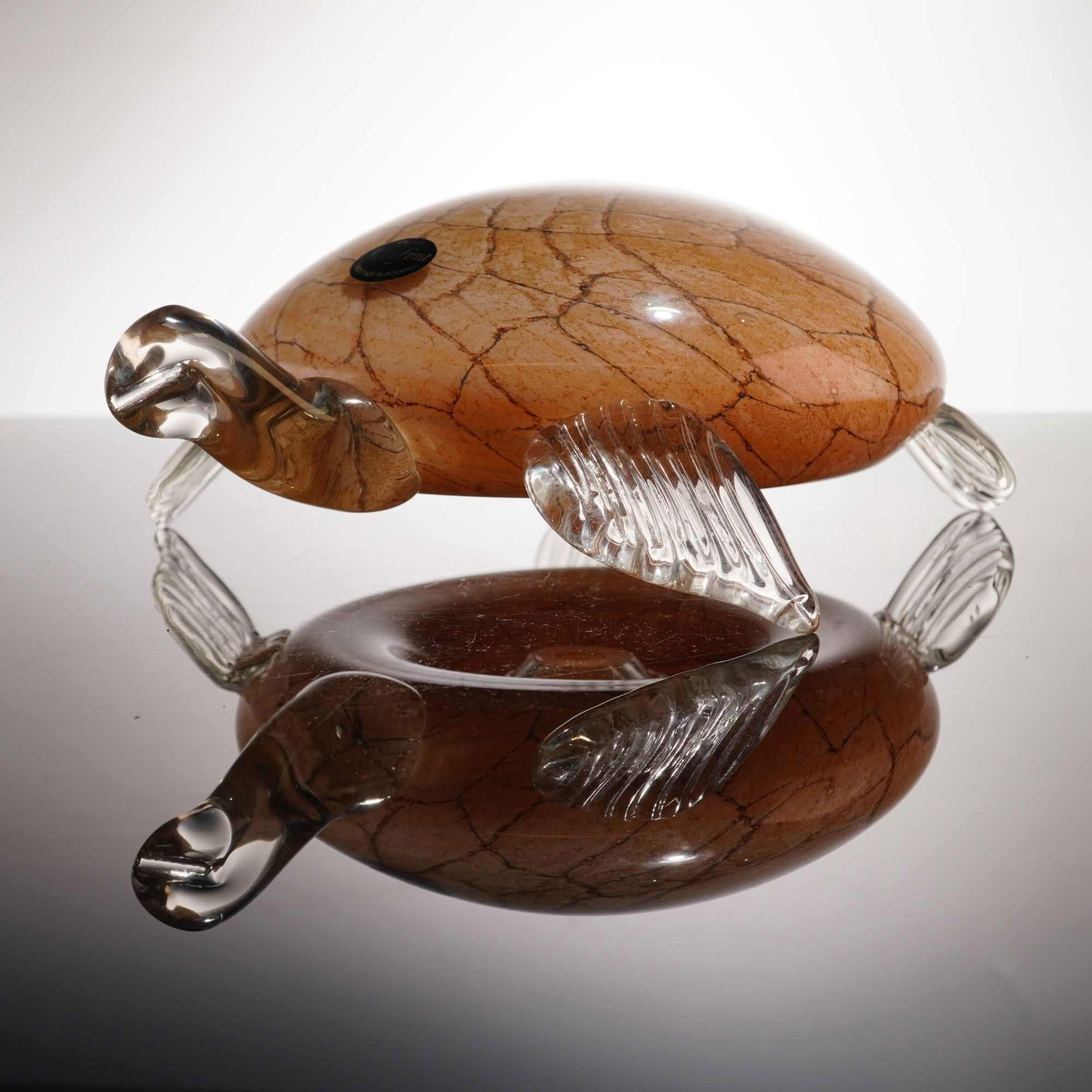 Jozefina Krosno Hand Blown Art Glass Sea Turtle Sculpture: This hand-blown art glass sea turtle sculpture was produced by Jozefina Atelier in Krosno, Poland. The piece features a stylized representational form with a large, domed shell of honey-amber glass en