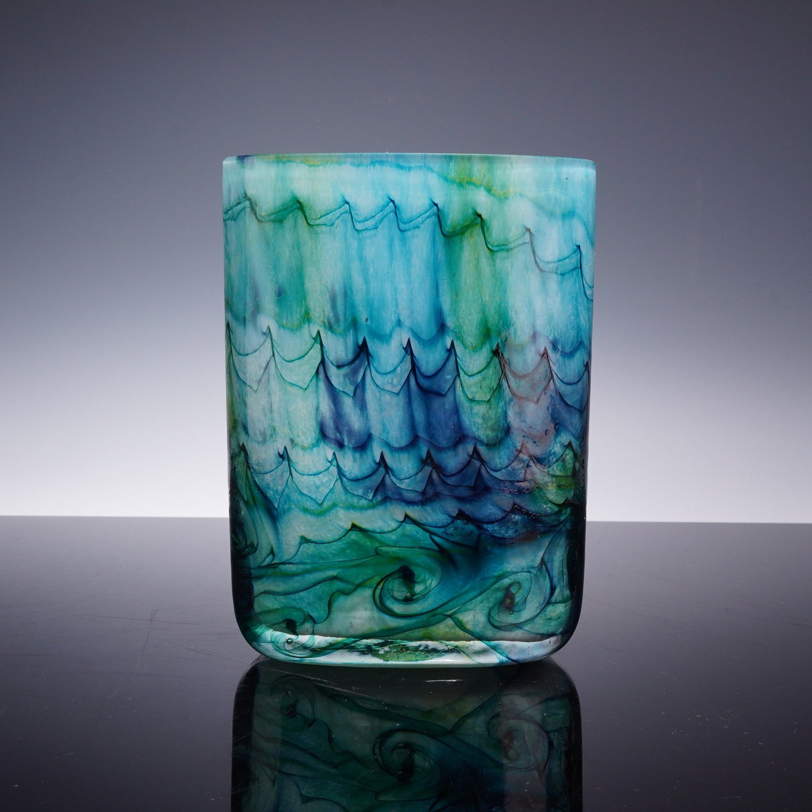 Isle of Wight Art Glass Seascape Pattern Vase: A contemporary hand-blown art glass vase by Isle of Wight Glass from the Seascape collection. This flattened rectangular pillow form features internal decoration with a combed feather motif in shades 