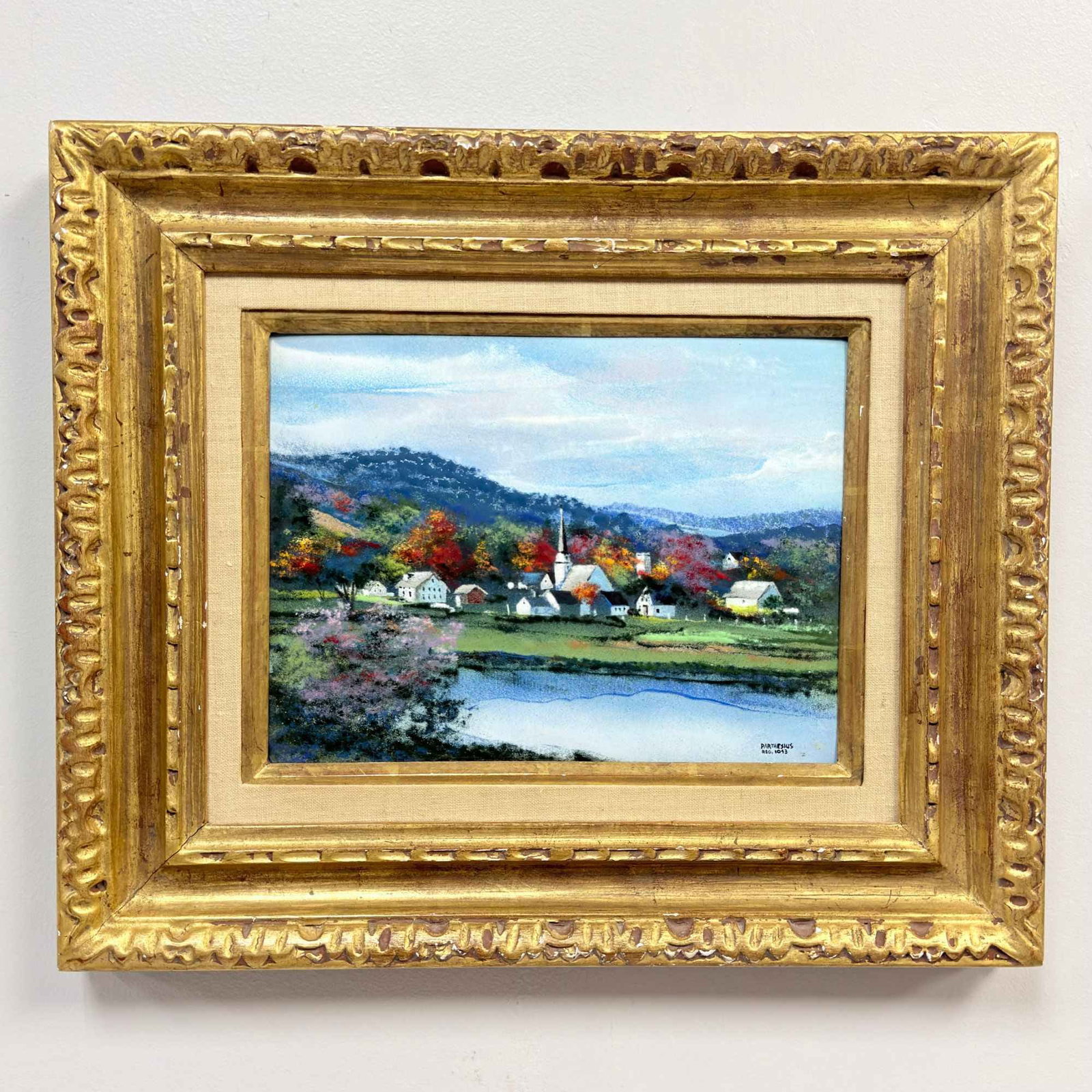 Charles Parthesius (American, 20th Century), Enamel on Copper Landscape: A vitreous enamel on copper plaque by Charles Parthesius (American, 20th century), depicting a rural New England village landscape in a folk art style. The composition centers on a classic white churc