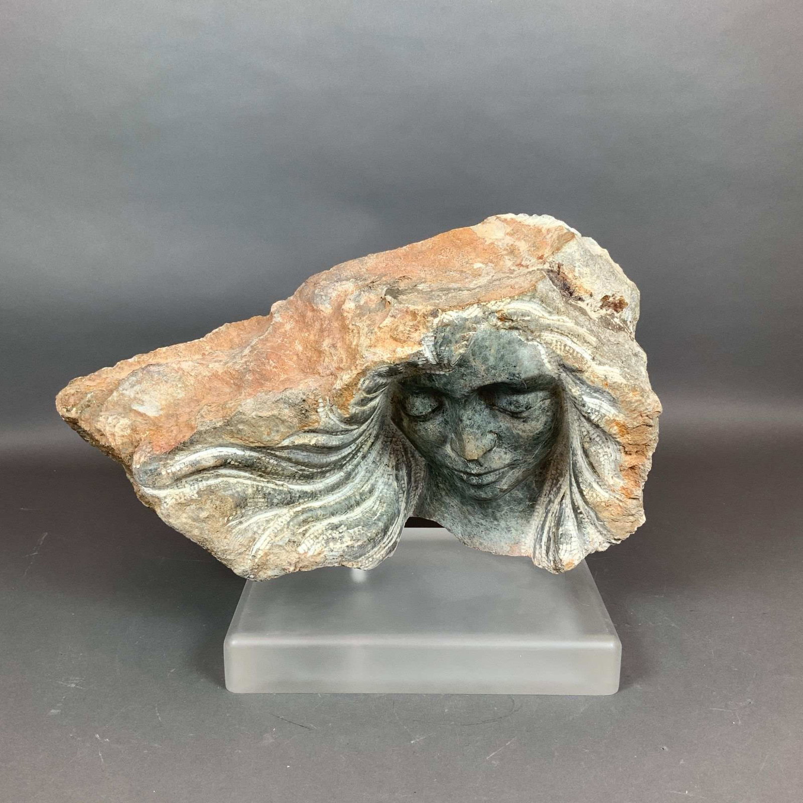 Michael Barkin (American, 20th Century) Carved Stone Sculpture of a Woman's Face (1 of 3)
