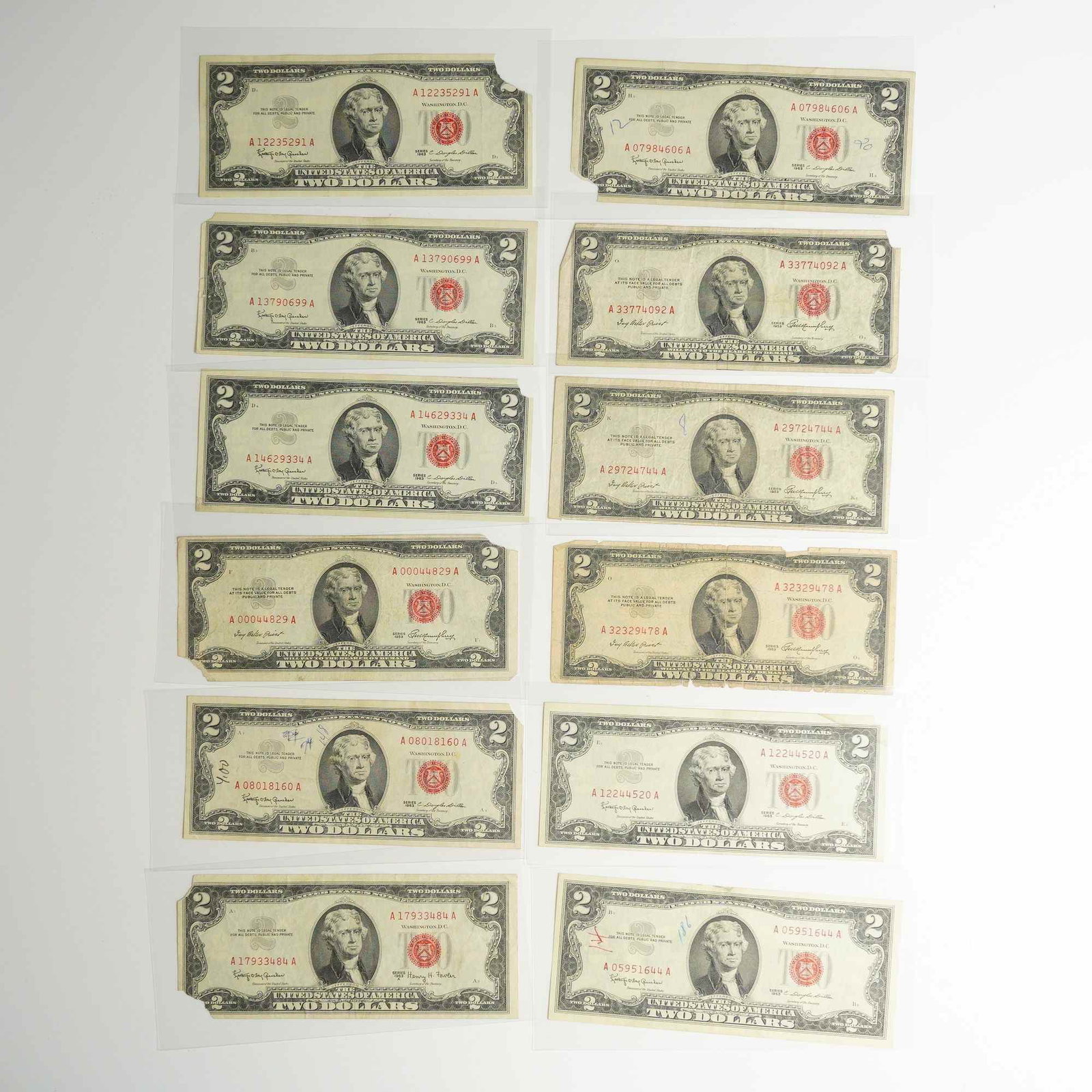 Eleven 1953, 1963 and 1963A US Two Dollars Red Seal Notes (1 of 2)