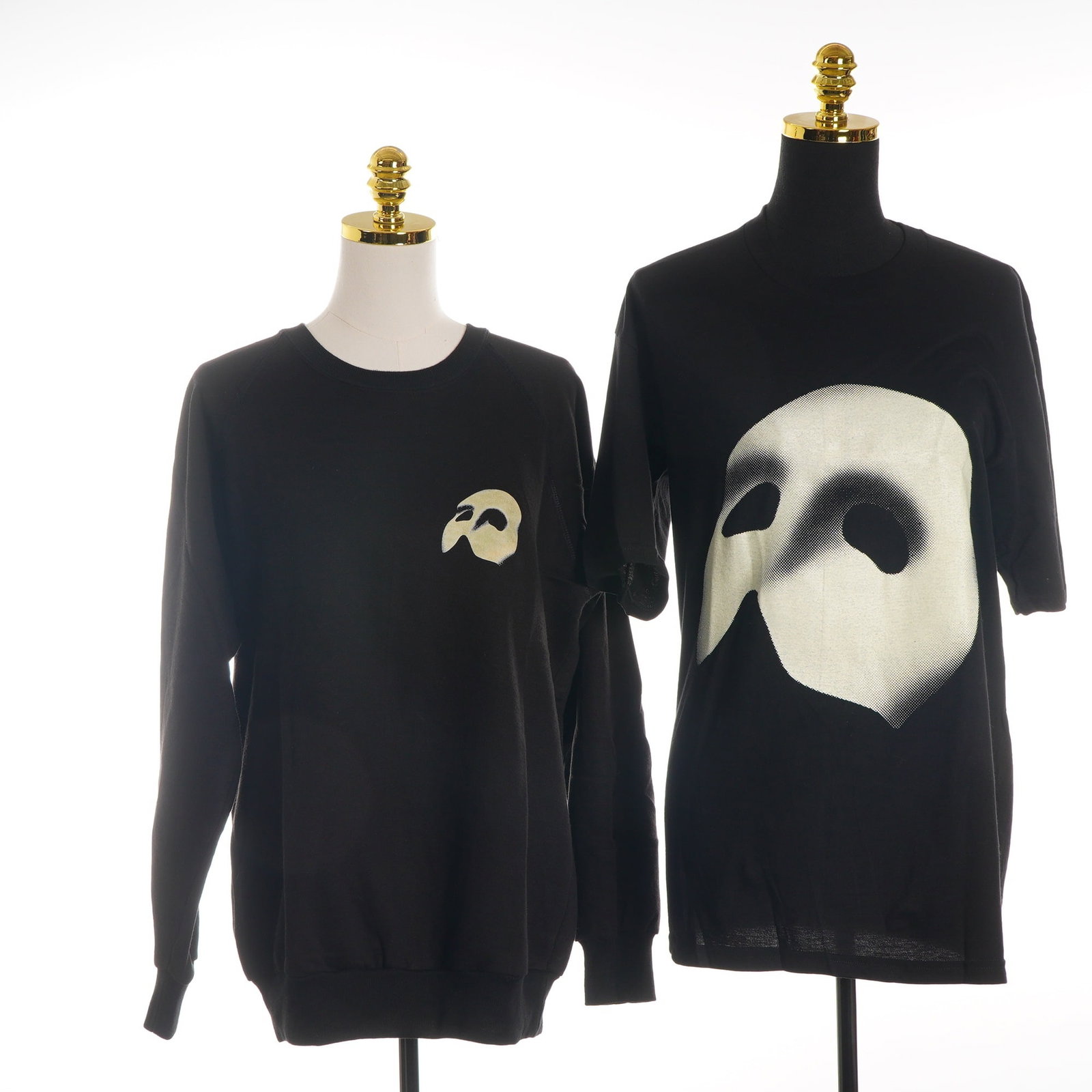 2pc Vintage Phantom of the Opera Glow-in-the-Dark Sweatshirt and T-Shirt: This lot comprises two pieces of official vintage theatrical merchandise for the musical The Phantom of the Opera, featuring glow-in-the-dark graphics. Both garments are size large and feature labels