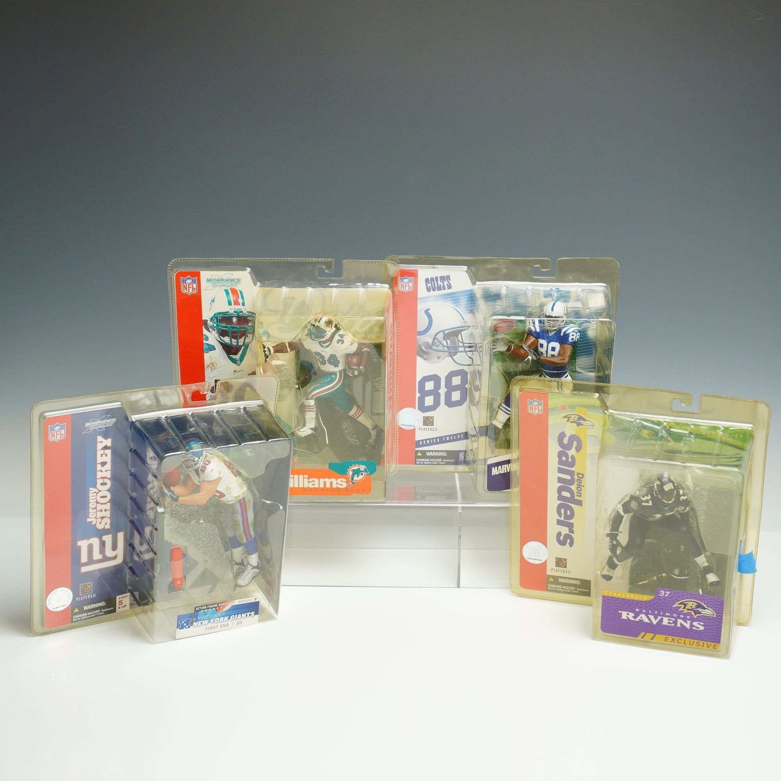 4pc McFarlane Toys NFL Figurines in Boxes featuring Ricky Williams, Marvin Harrison, Jeremy Shockey, (1 of 3)