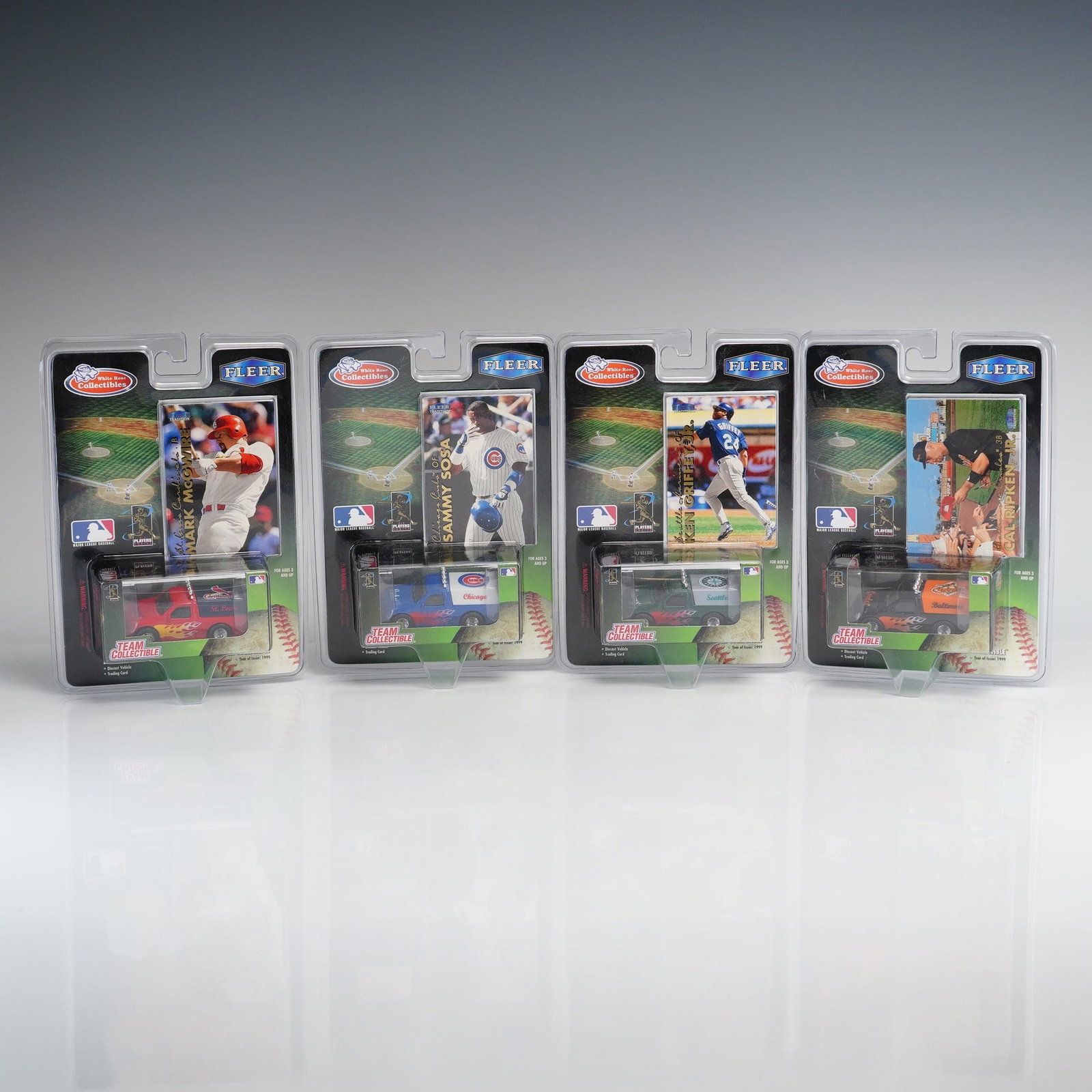 4pc 1999 White Rose Collectibles MLB Team Collectible Sets including McGwire, Sosa, Griffey Jr., and: This collection consists of four factory-sealed MLB Team Collectible sets produced by White Rose Collectibles in 1999. Each set includes a 1:64 scale die-cast pickup truck featuring team-specific grap