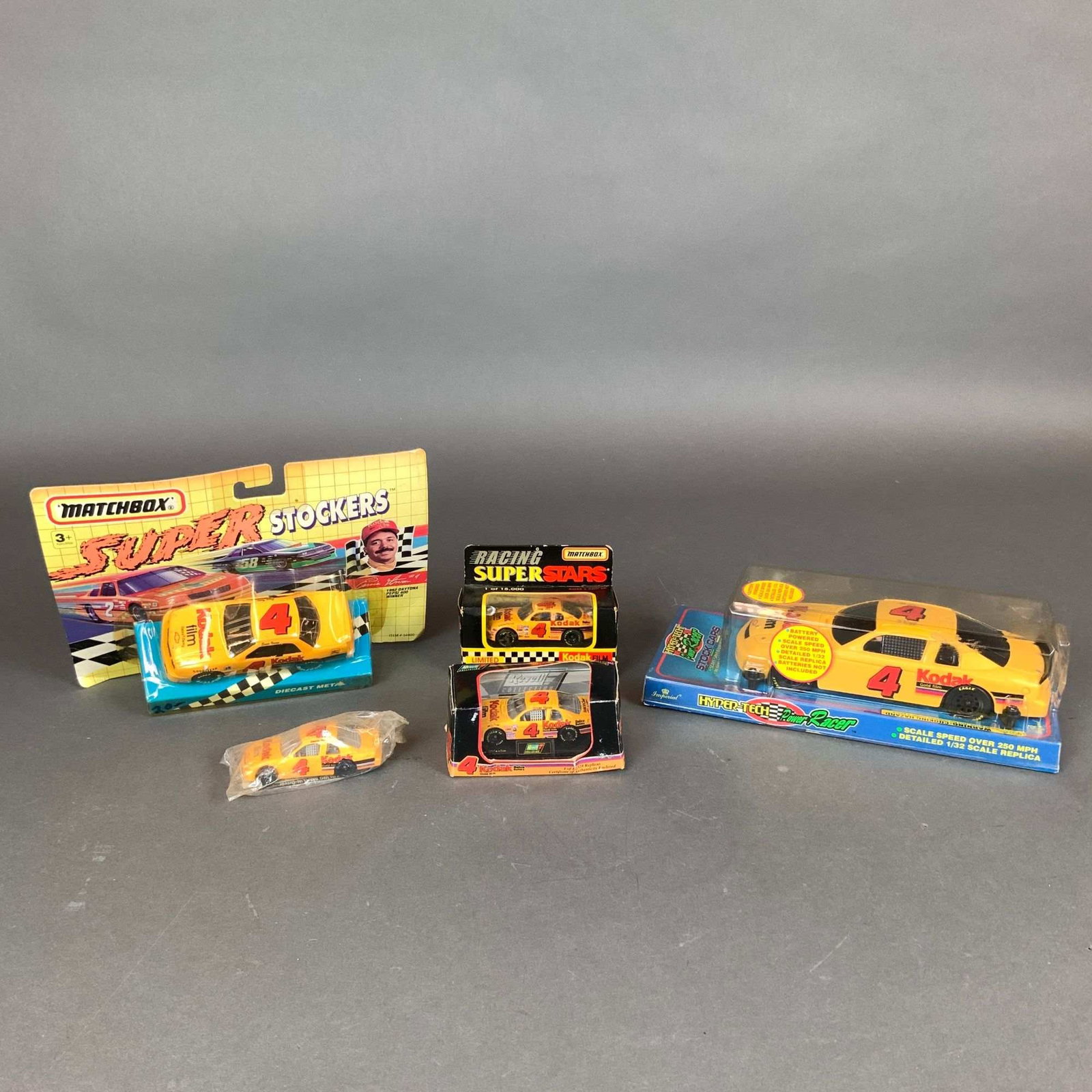 A Collection of 5 NASCAR #4 Kodak Racing Model Cars by Matchbox, Revell, and Imperial (1 of 3)