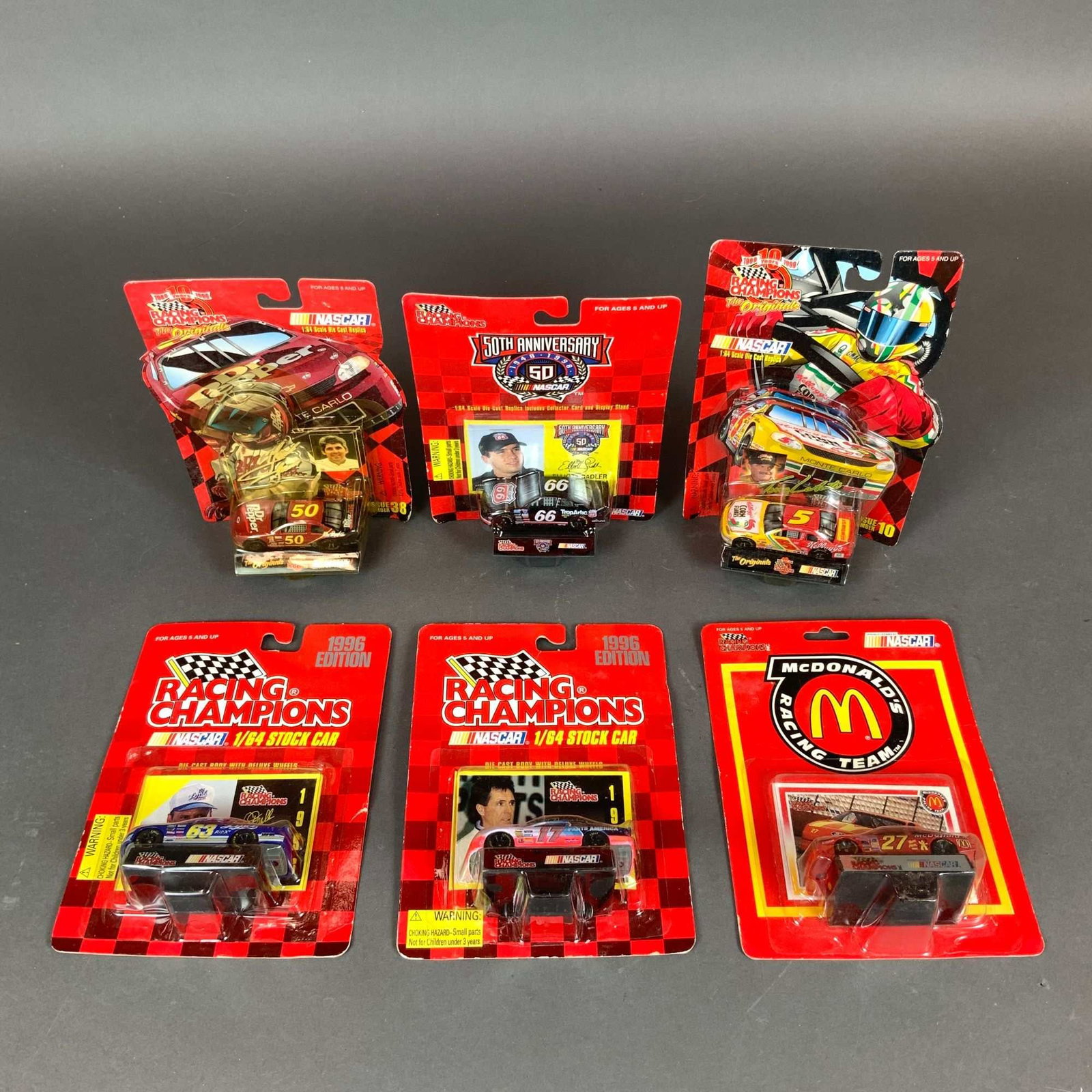 Lot of 6 Racing Champions NASCAR 1/64 Scale Die-Cast Stock Cars: This lot consists of six individual NASCAR die-cast stock car replicas manufactured by Racing Champions in 1/64 scale. Each vehicle is contained within its original factory blister pack and includes a
