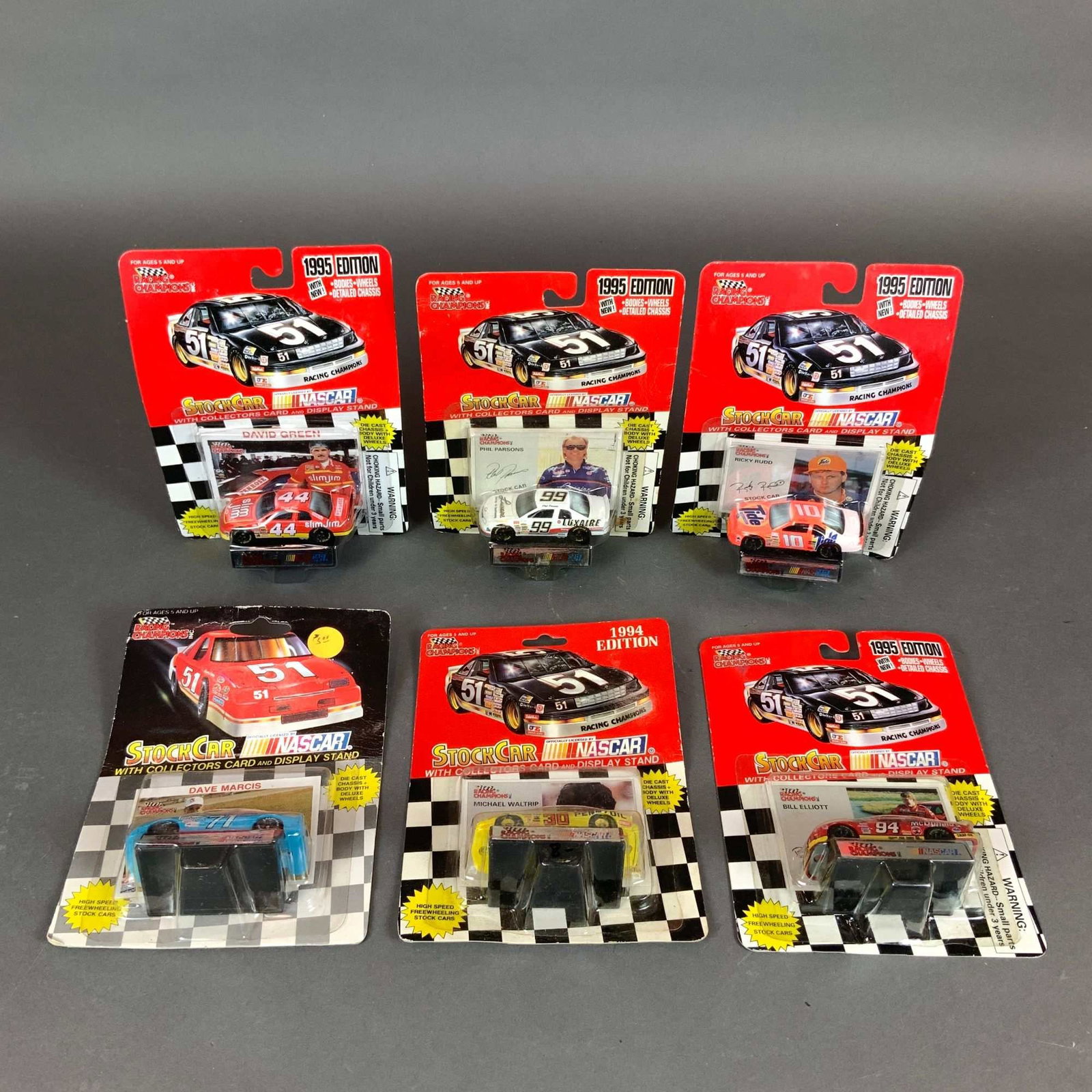 6pc Racing Champions NASCAR Die-Cast Stock Cars: This collection consists of six vintage NASCAR 1:64 scale die-cast stock car models manufactured by Racing Champions. Each vehicle is housed in its original factory blister packaging and includes a co