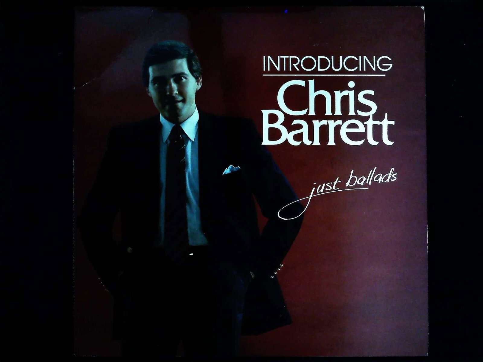 Introducing Chris Barrett Just Ballads 1992 Canadian LP Vinyl Record: A single 12-inch black vinyl LP record album by Chris Barrett, titled Introducing Chris Barrett Just Ballads, executed in the contemporary popular music style of the early 1990s. The record is housed 