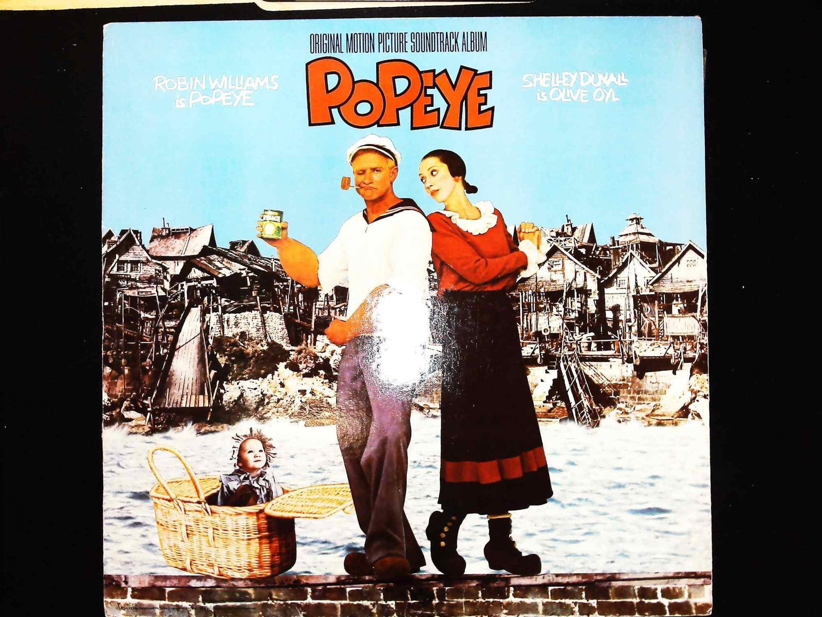 Popeye Original Motion Picture Soundtrack Promotional Vinyl LP Harry Nilsson 1980: This is an original motion picture soundtrack vinyl LP for the 1980 film Popeye, featuring music and lyrics composed by Harry Nilsson. The album was released by Boardwalk Entertainment Co. under catal