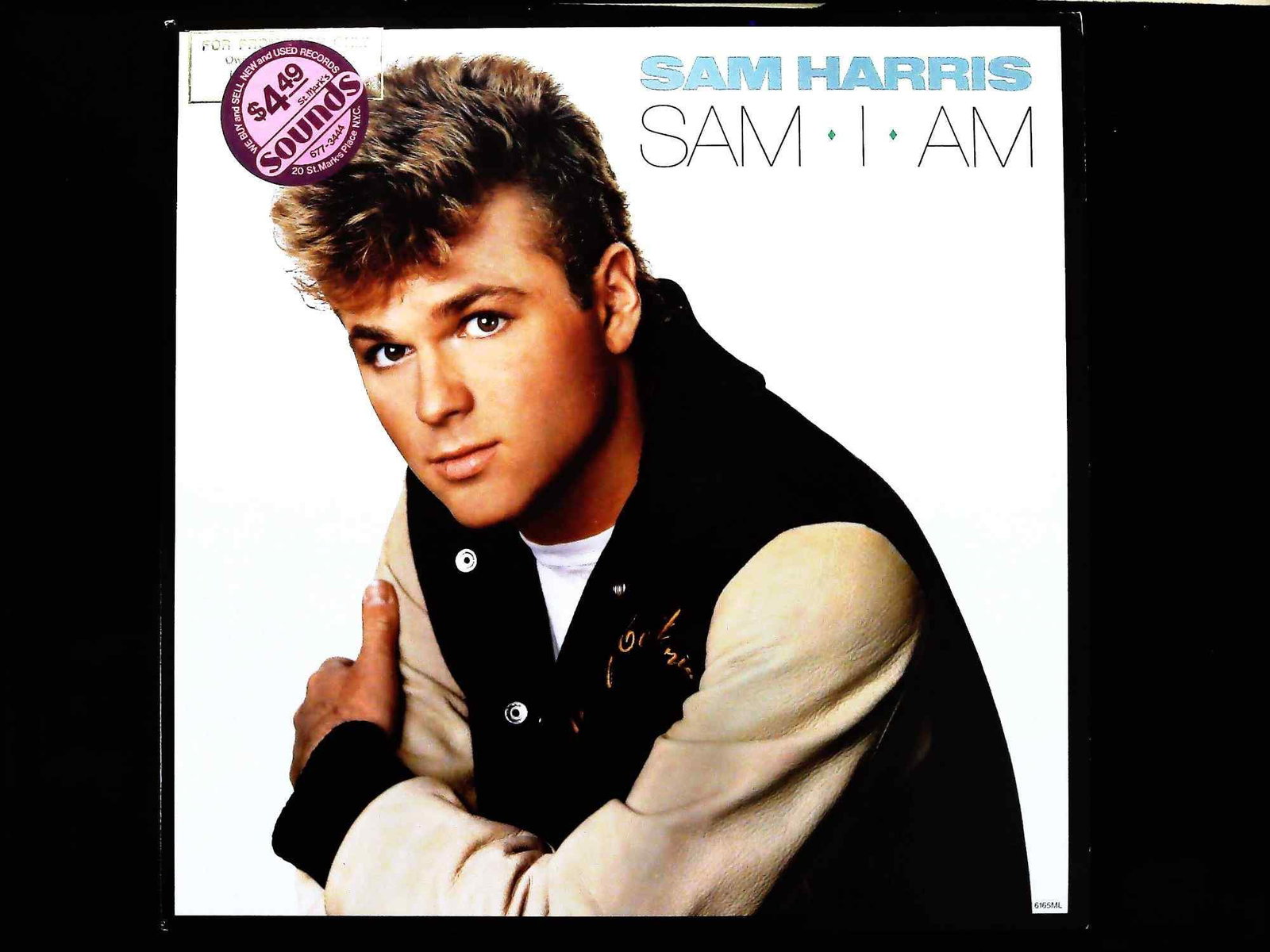 Sam Harris Sam-I-Am Vinyl LP 1986 Motown 6165ML Promotional Copy: Sam Harris Sam-I-Am vinyl LP record, released by Motown Record Corporation in 1986 under catalog number 6165ML. This item is a promotional pressing. The cardboard sleeve features a photographic portra