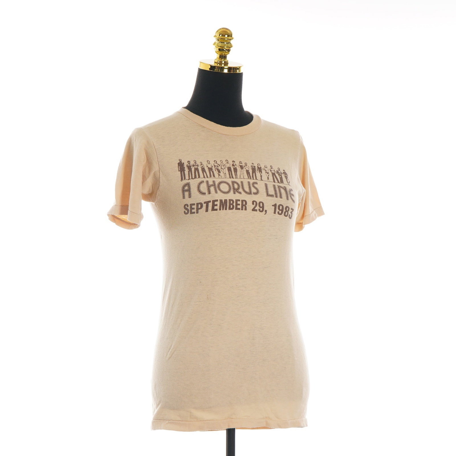Vintage 1983 A Chorus Line Broadway Musical Promotional Single Stitch T-Shirt Screen Stars Tag: This vintage short-sleeve crew neck t-shirt is a commemorative garment from 1983 for the Broadway musical A Chorus Line. It is constructed from a light beige 100% cotton jersey and features