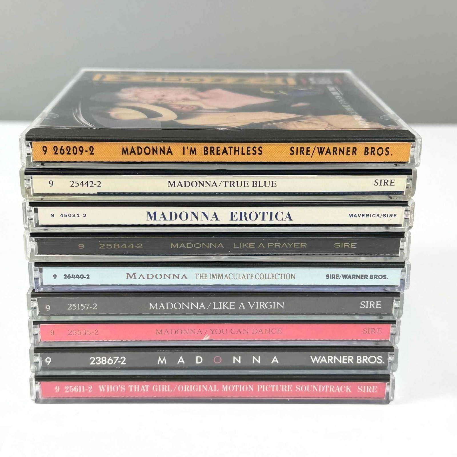 9pc Collection of Madonna Compact Discs: This 9pc CD grouping of Madonna contains a selection of studio albums, soundtracks, and remix collections released between 1983 and 1992. The collection consists of domestic United States pressings