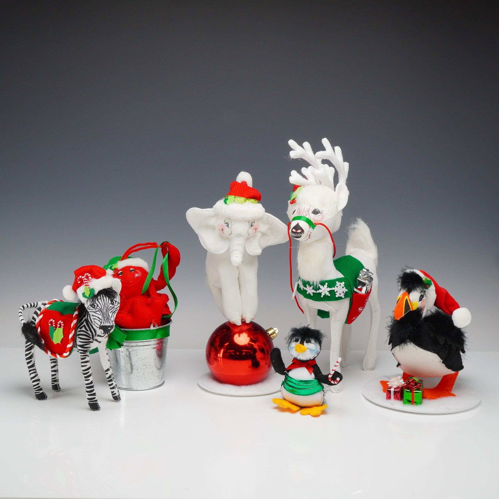 6pc Annalee Dolls Christmas Animal Figurines: A set of six holiday-themed felt animal figurines from Annalee Dolls. Each figure is constructed from cloth and felt over a poseable wire armature with stationary, hand-painted facial features, a
