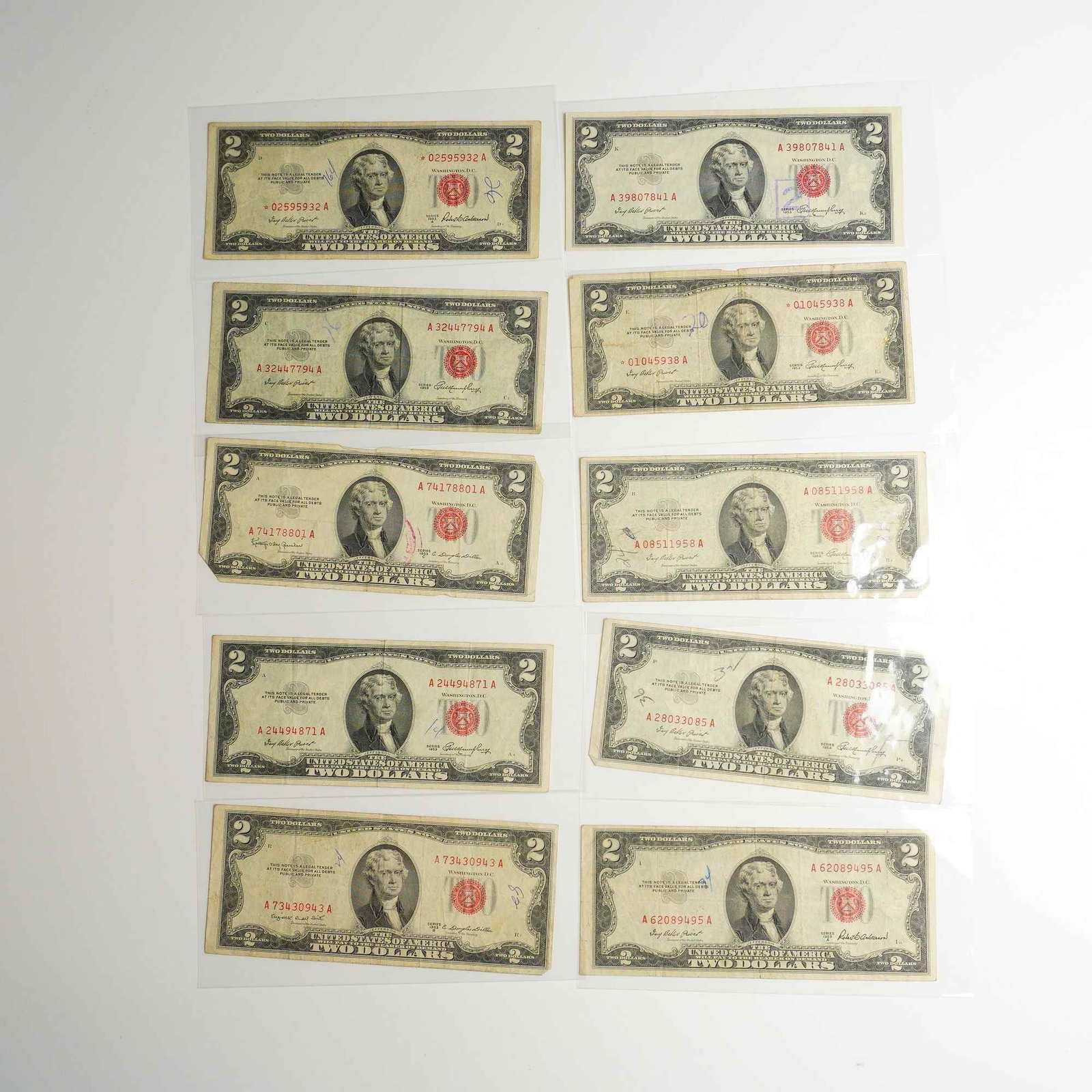 Ten 1953, 1953A, 1953B, & 1953C US Two Dollars Red Seal Notes including Star Notes (1 of 2)