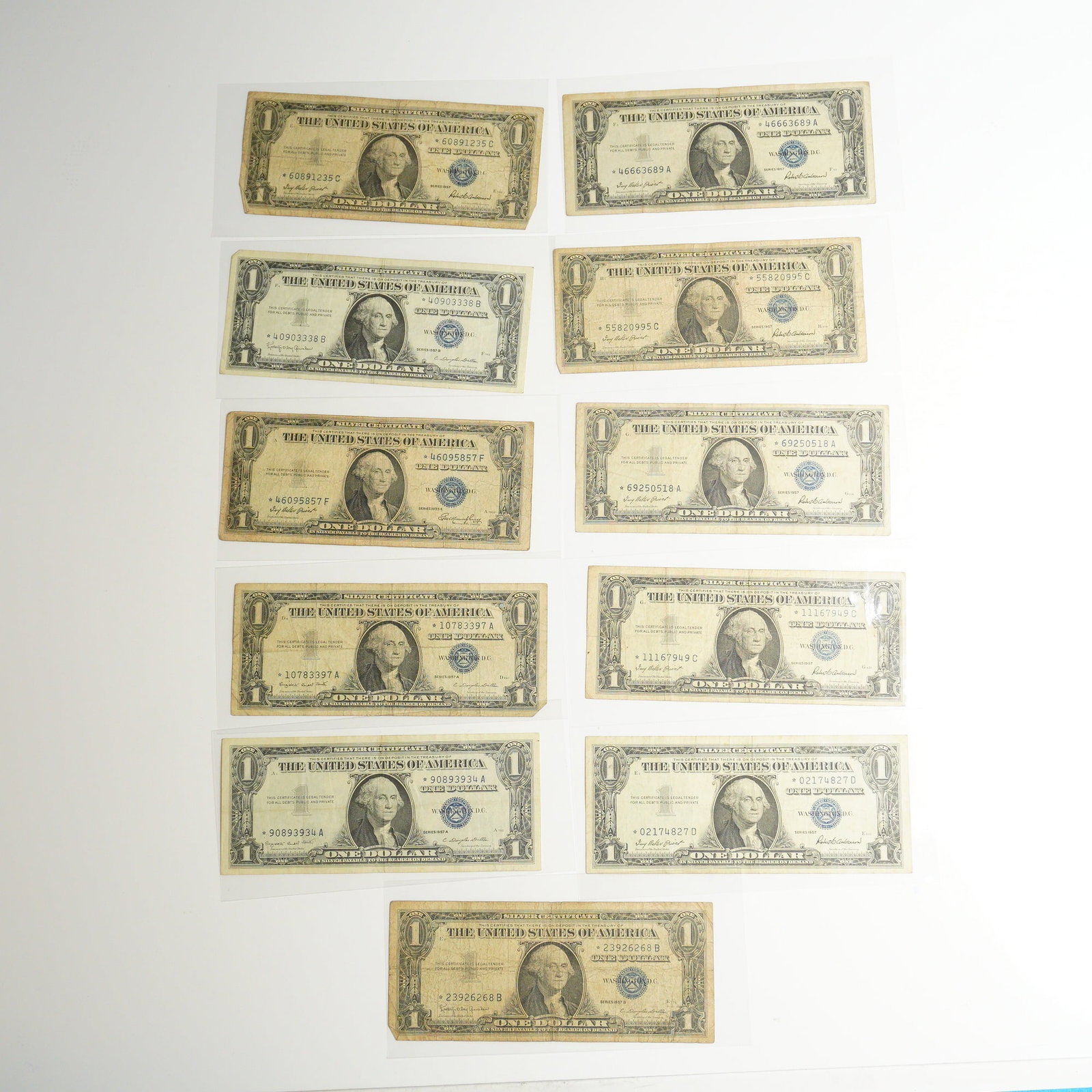 Eleven 1953-E, 1957 and 1957-A & B US One Dollar Silver Certificate Star Notes (1 of 2)
