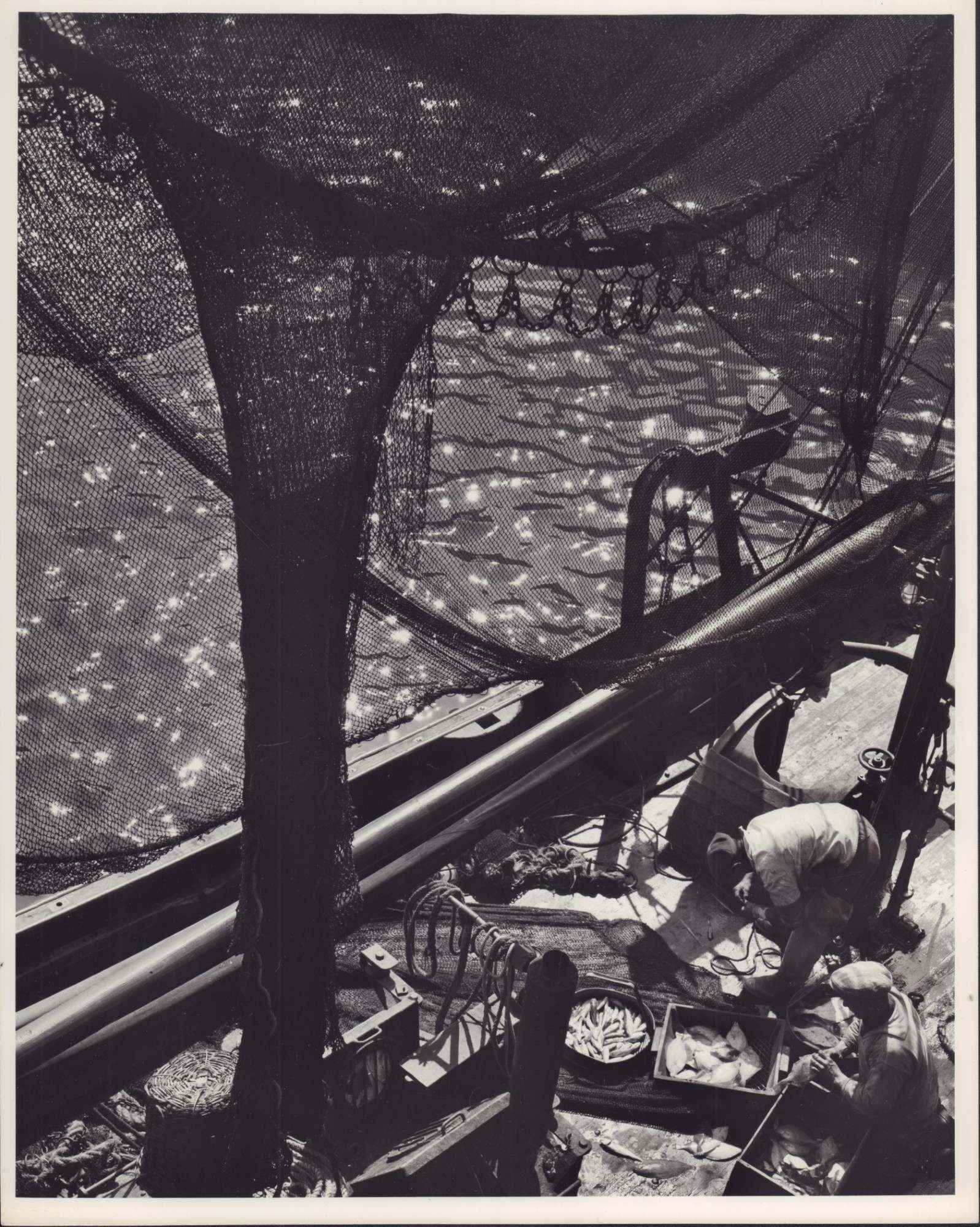 2pc Eliot Elisofon (American, 1911-1973) Gelatin Silver Prints Depicting Fishing Scenes: This lot consists of two original gelatin silver prints on fiber paper by the American photographer Eliot Elisofon (1911-1973), known for his extensive career with LIFE magazine. One photograph presen