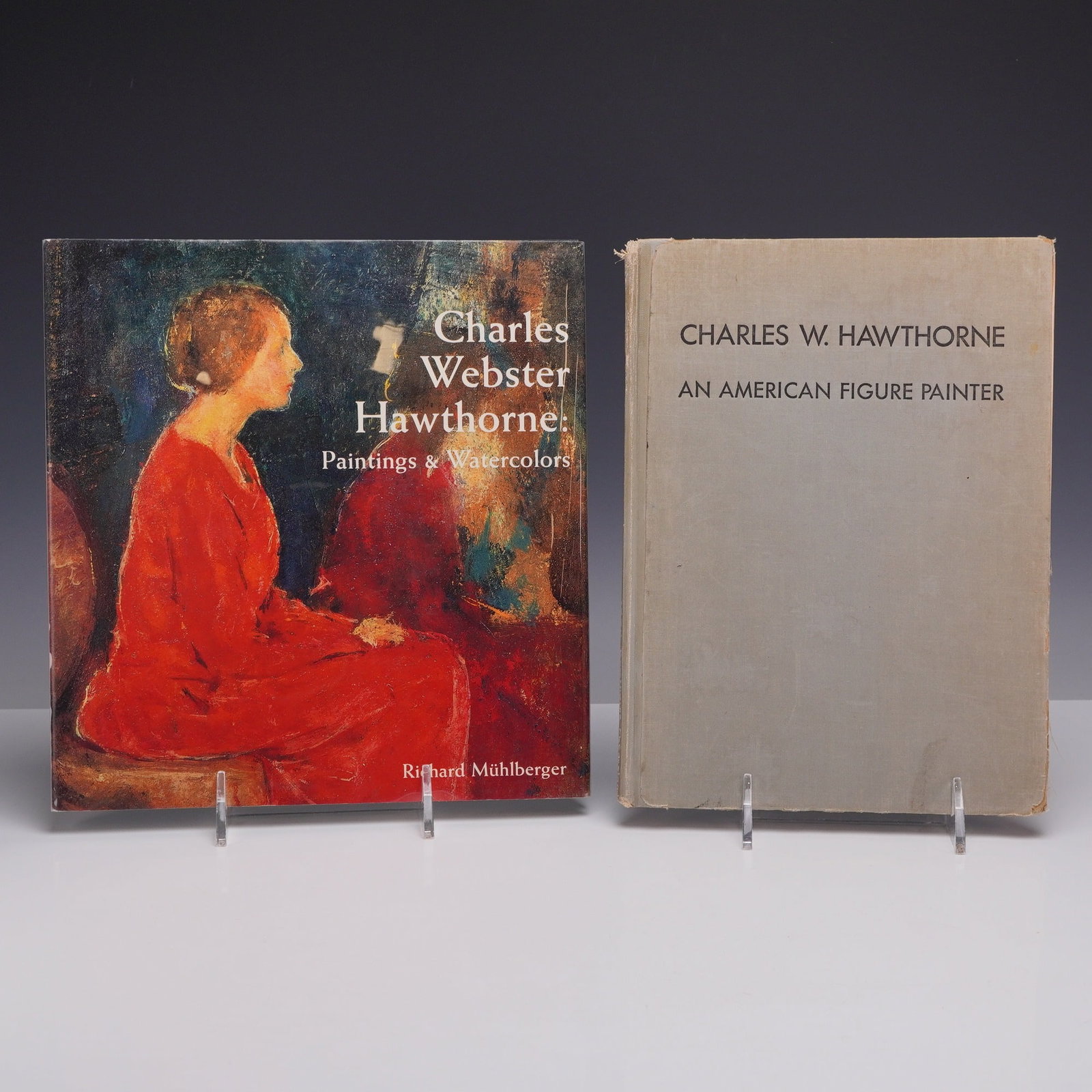 Two Monographs on the Artist Charles Webster Hawthorne, 1947 and 1999: This lot consists of a 2pc art books-hardcover set documenting the life and career of American realist painter Charles Webster Hawthorne (1872-1930). The first volume is Charles Webster Hawthorne: