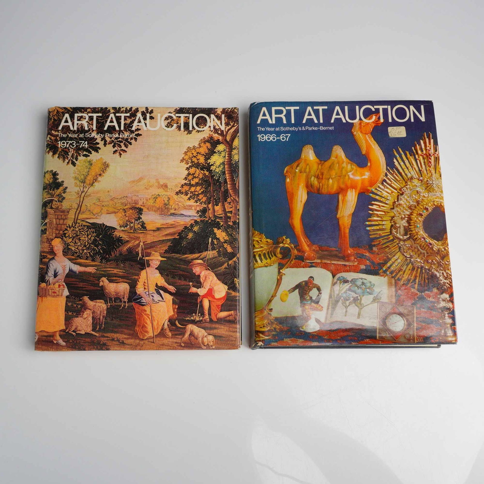 2pc Art at Auction: This lot of 2 Art at Auction Sotheby's books includes two reference volumes reviewing the annual auction seasons at Sotheby's and Parke-Bernet. The 1966-67 volume, edited by Philip Wilson, was publish