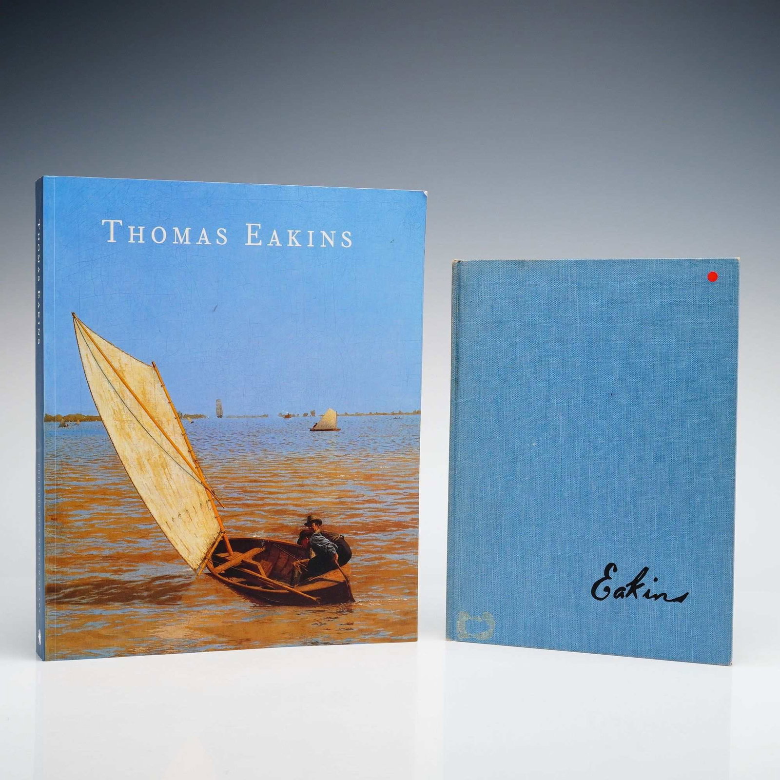 2pc Thomas Eakins Monographs: This collection features two books documenting the career of American realist artist Thomas Eakins (1844-1916). The first volume is a large-format quarto exhibition catalogue, Thomas Eakins, by