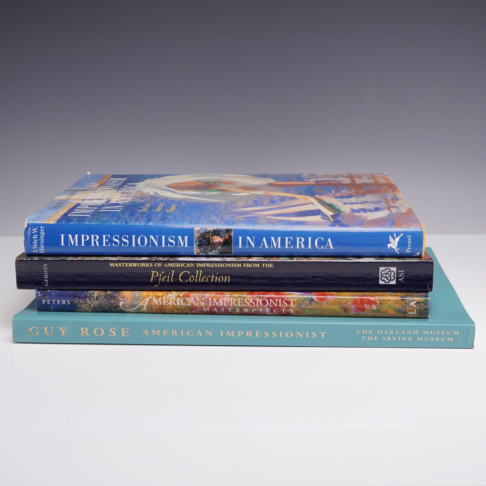 4pc American Impressionist Art Books: This lot of four large-format art reference books focuses on American Impressionism. The collection includes: Ulrich W. Hiesinger's Impressionism in America: The Ten American Painters (Prestel, 1991);