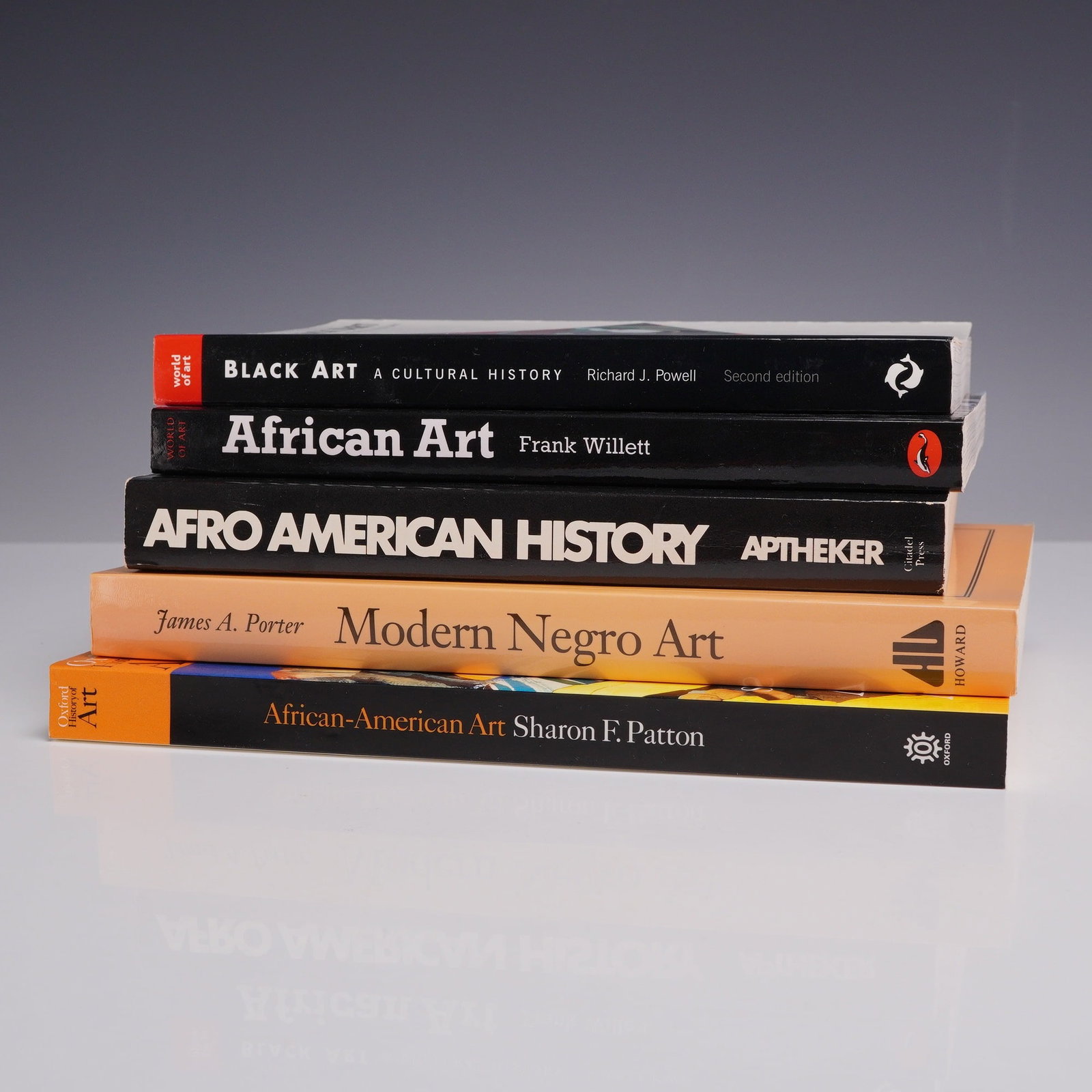 5pc African American Art and History Books. Various Publishers.: This lot of five softcover volumes focuses on the history and cultural impact of African American and African art. The collection includes: Black Art: A Cultural History by Richard J. Powell (Thames &