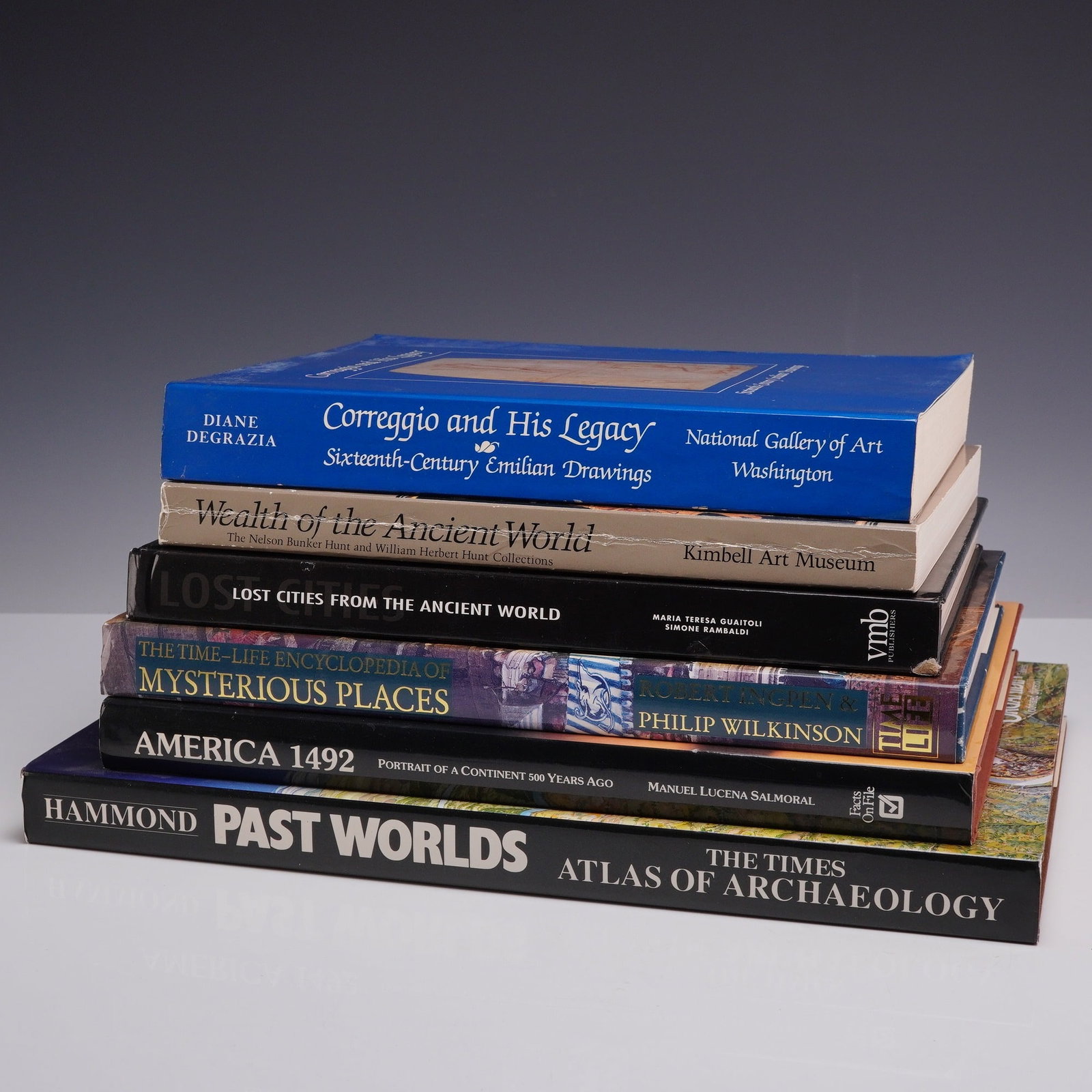 A Collection of 6 Books on Art and Archaeology including America 1492. Various Publishers, 1983-2002: This collection of 6 books comprises a variety of hardcover and paperback volumes focused on art history, archaeology, and ancient civilizations. The group includes several large-format folio and