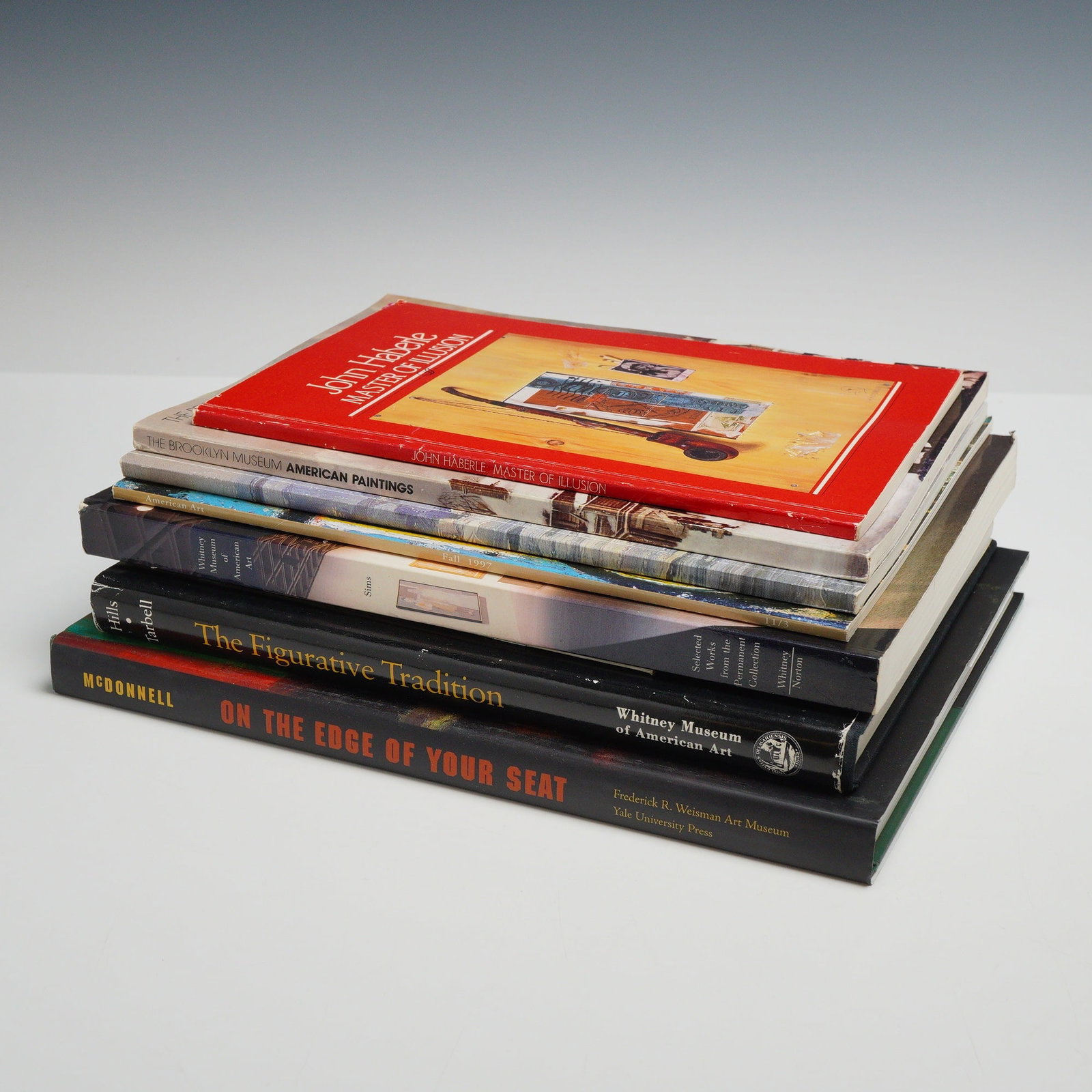 A Collection of 8 American Art Books and Exhibition Catalogs: This lot comprises a collection of eight publications focusing on American art history, museum collections, and exhibition catalogs. The group includes two hardcover volumes with dust jackets: On the 