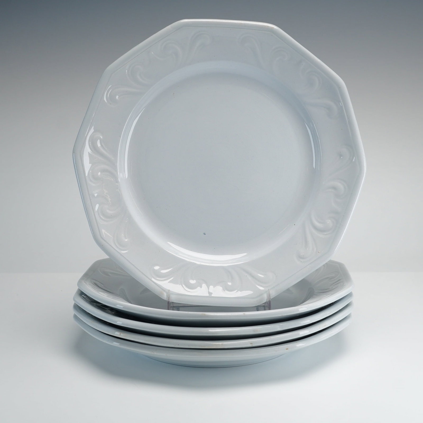 Set of Five Mayer and Elliot White Ironstone Octagonal Plates: A set of five mid-19th century white ironstone earthenware plates manufactured by the Staffordshire firm Mayer and Elliot. Each plate is designed with a paneled octagonal form and features a molded