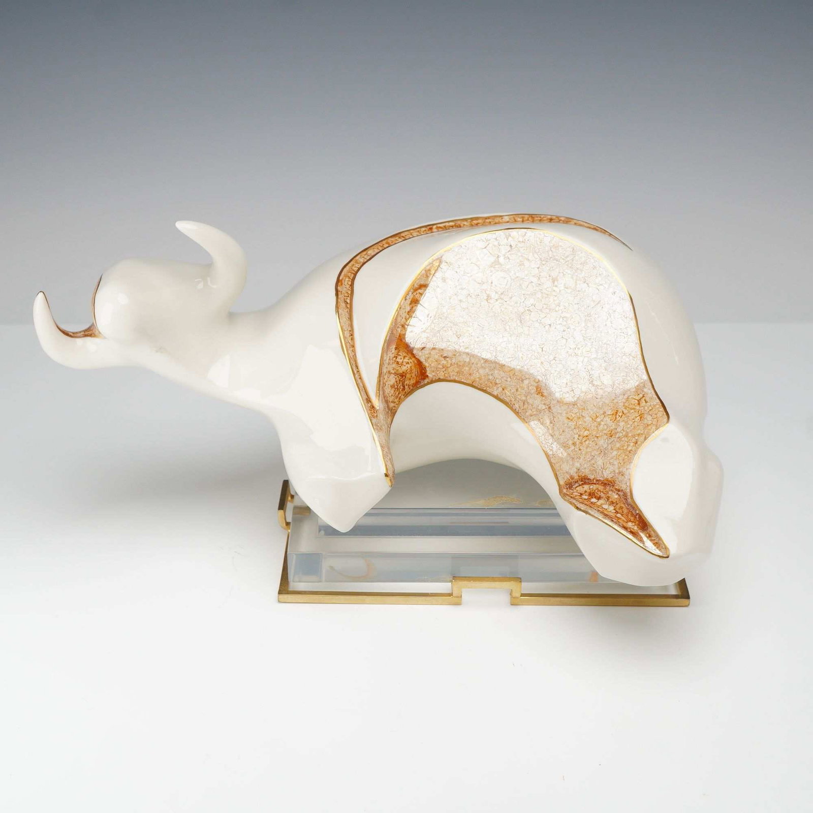 Galos Spanish Porcelain Bull Sculpture #8567 with Base: A modernist abstract porcelain figurine representing a bull from the Olivia collection by Galos. The sculpture features a streamlined, minimalist form with a smooth white glazed surface. The piece is 