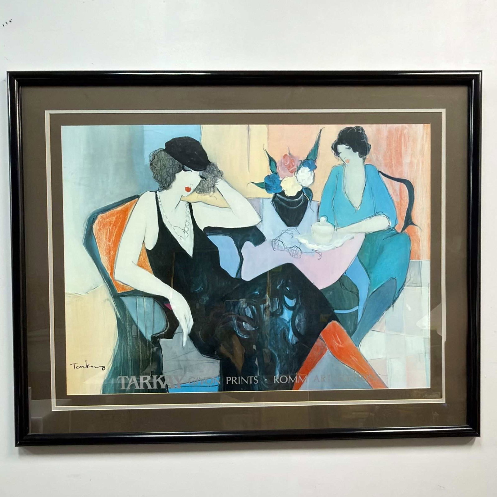 Itzchak Tarkay (Israeli, 1935-2012), Offset Lithograph Fine Art Poster on Paper, Maria and Susie: This 1991 offset lithograph fine art poster, titled Maria and Susie, is by Israeli artist Itzchak Tarkay (1935-2012). The artwork depicts two women in a stylized, modern interior seated at a table