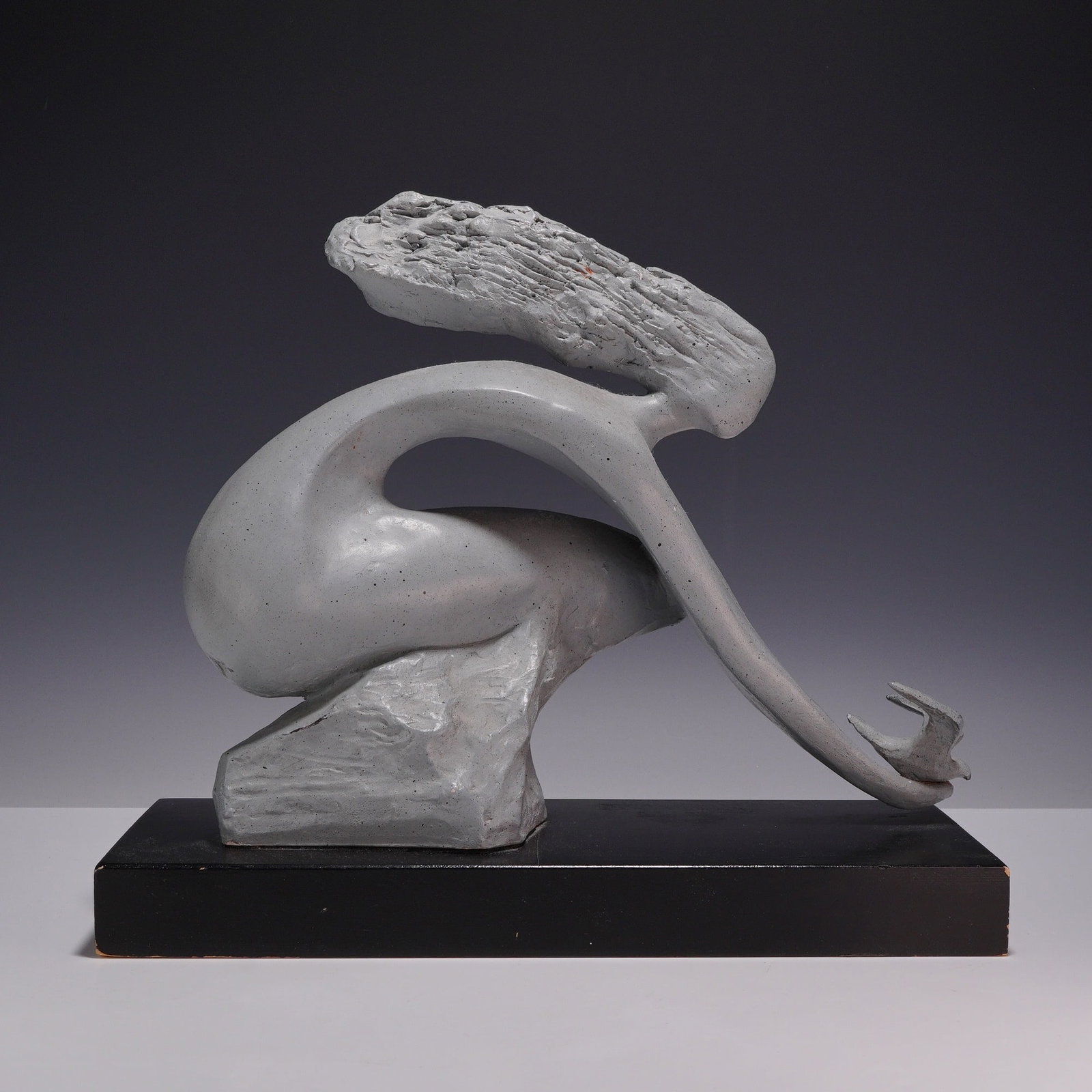 David Fisher for Austin Productions Sculpture, Freedom Flight: A David Fisher Freedom of Flight cast durastone sculpture produced by Austin Productions, dated 1980. The work features a stylized modernist female figure in a crouched pose with long, textured hair