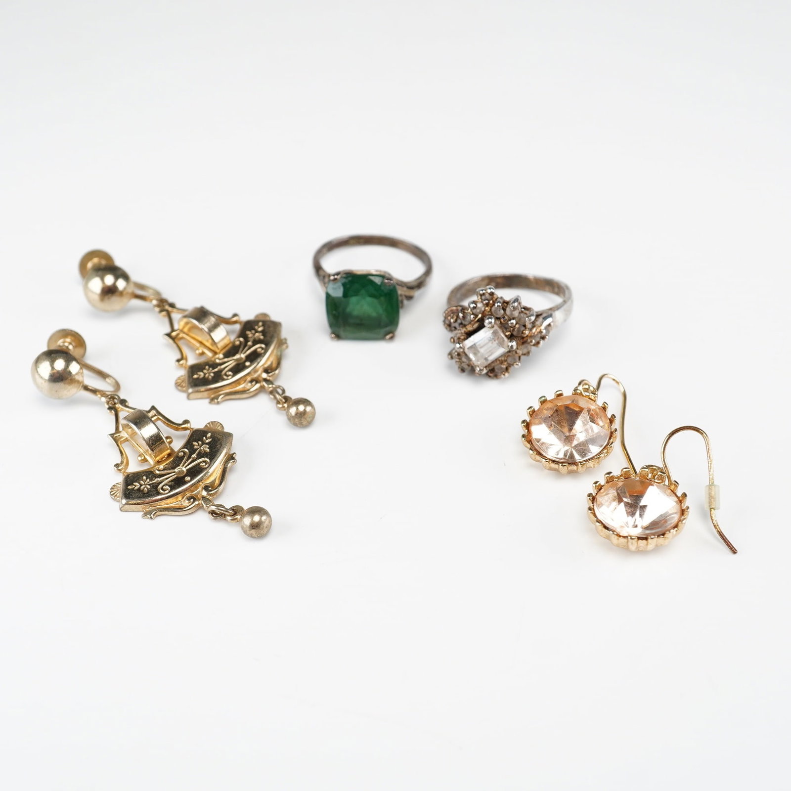 Lot of 6 Pieces of Silver Plated Jewelry Including Two Rings and Two Pairs of Earrings: This lot comprises six pieces of jewelry identified as silver plated based on testing with a Thermo Scientific Niton XL2 XRF Precious Metal Analyzer. The group includes two rings and two pairs of
