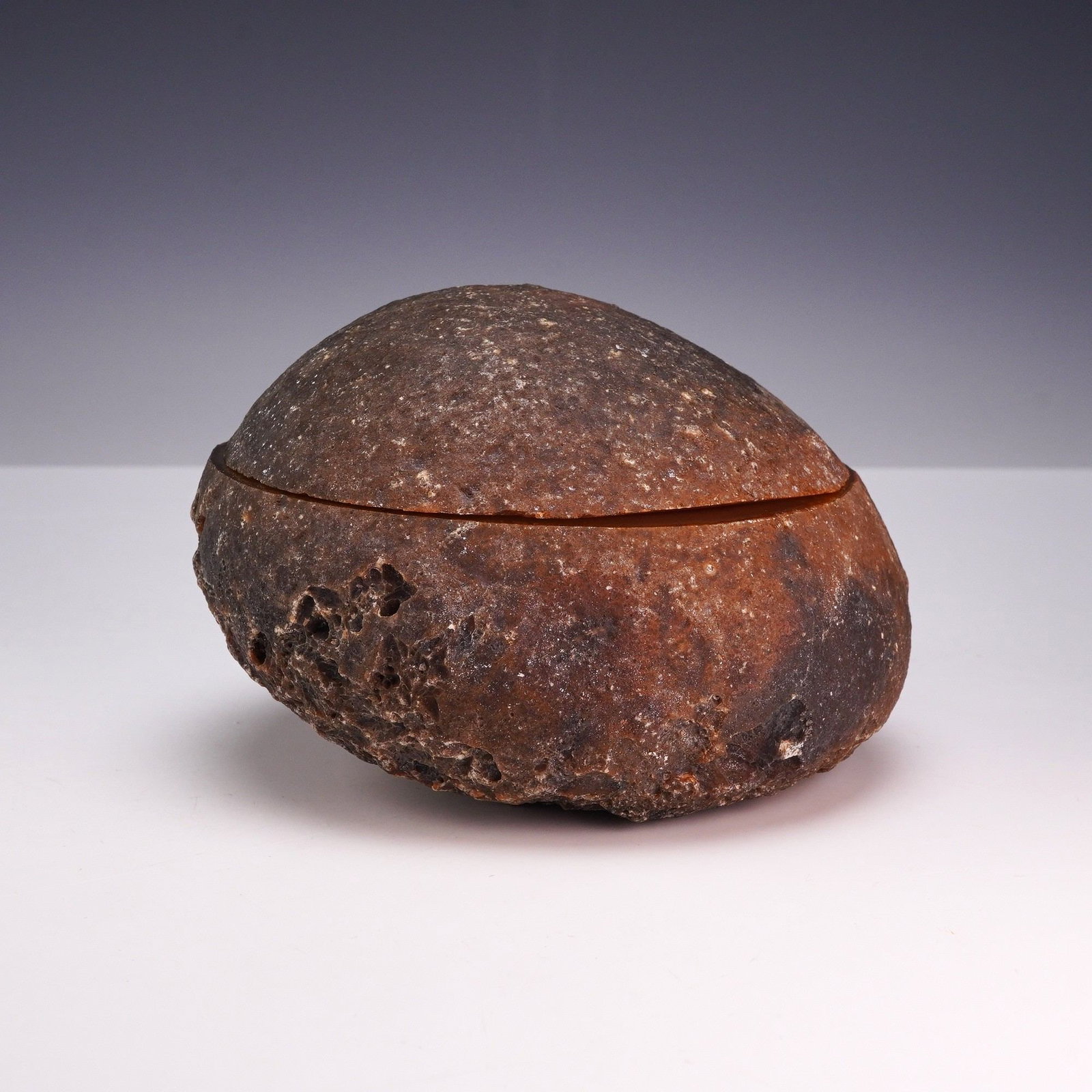 2pc Citrite and Quartz Geode: A natural citrite and quartz geode specimen, horizontally cut and polished into two matching sections to form a lidded vessel. The exterior rind retains its natural, rugged, dark-brown earthy