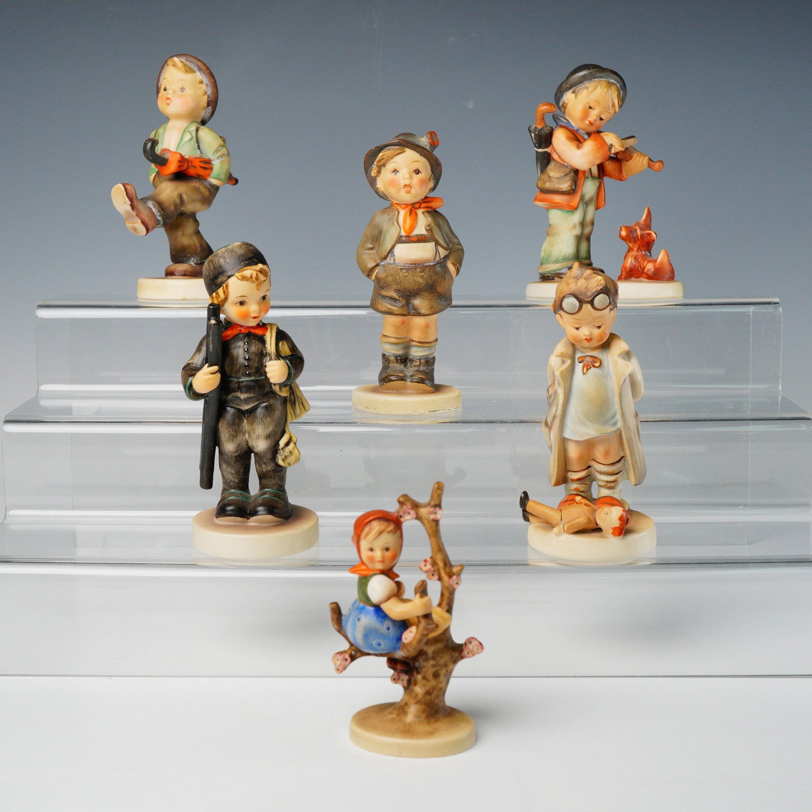 A Collection of Six M. I. Hummel Goebel Ceramic Figurines (1 of 5)