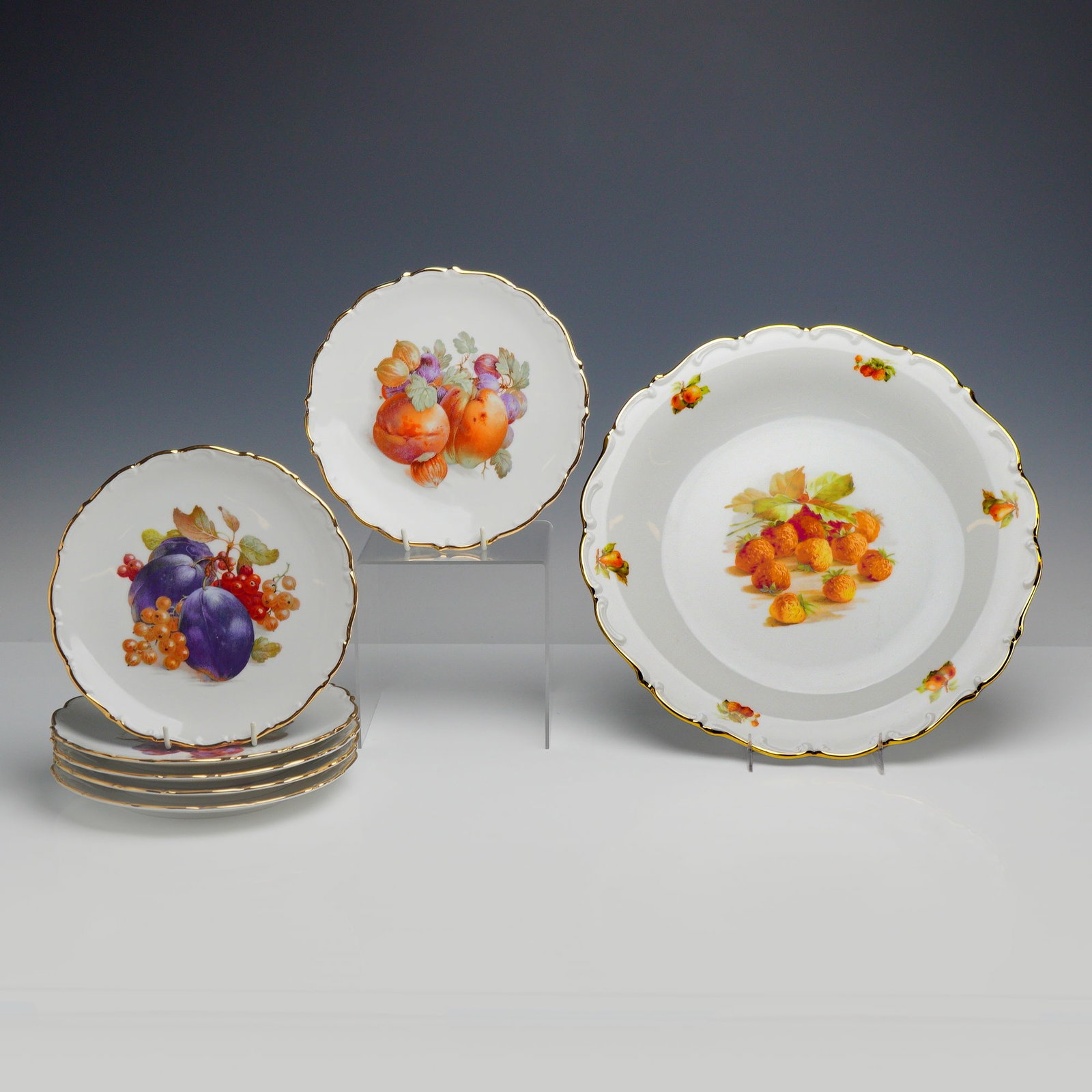 7pc Schumann Arzberg Bavaria Germany Fruit Pattern: This 7 piece set of fine porcelain tableware was produced by the Schumann factory in Arzberg, Bavaria, Germany. The service features the Fruit pattern and consists of a large serving bowl and six