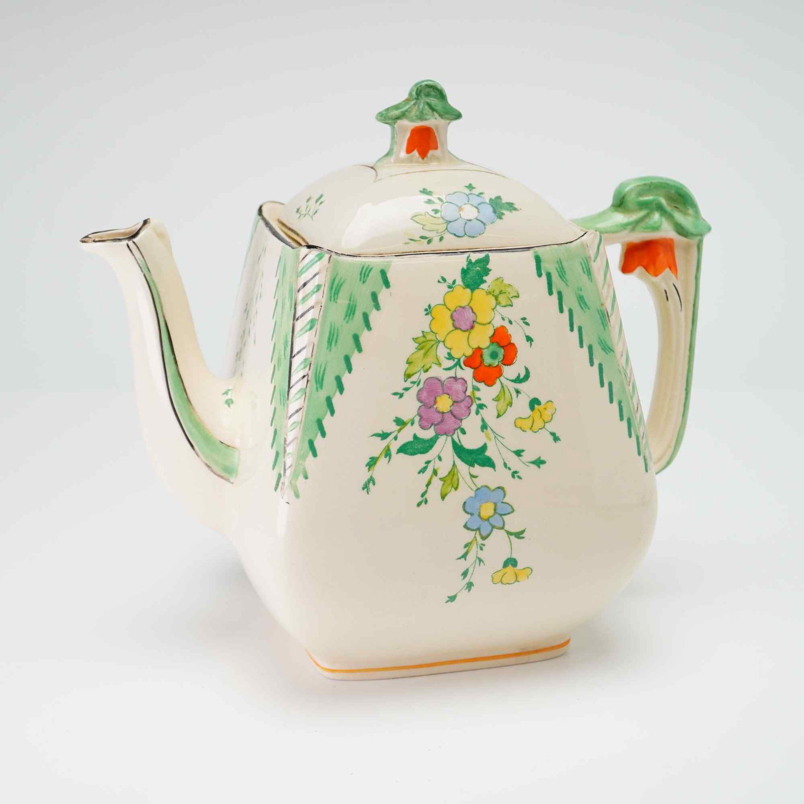 Burleigh Ware Art Deco Maytime Pattern Teapot in Imperial Shape: A Burleigh Ware earthenware teapot featuring the Maytime pattern and the Imperial shape. Manufactured by Burgess and Leigh in Burslem, England, this piece exhibits a tapered square-section body with