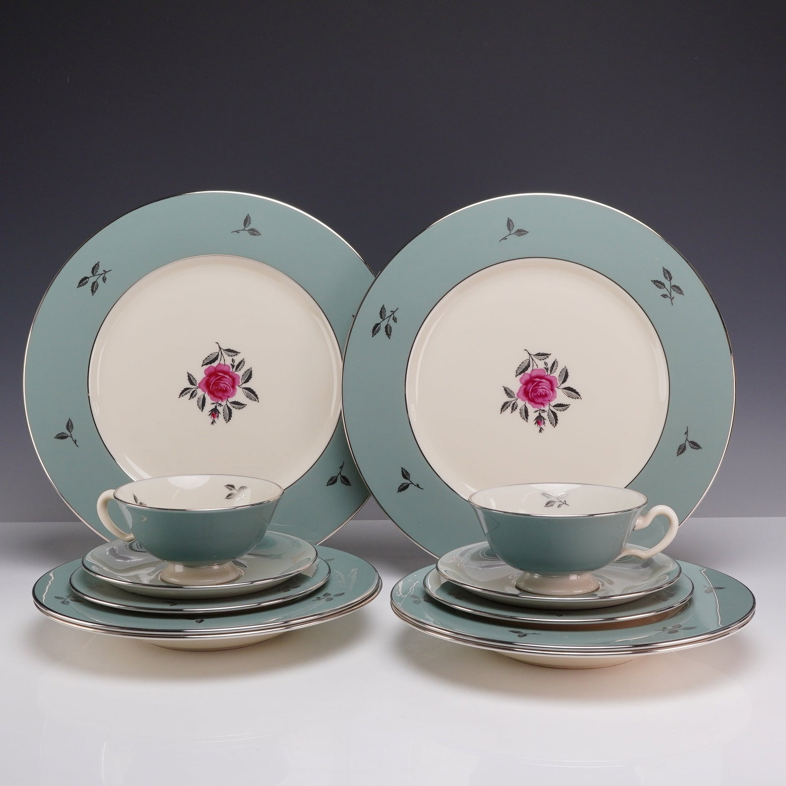 12pc Lenox Porcelain Tea Service Set, Duet: This twelve-piece Lenox partial dinner service in the Duet (E 550) pattern features creamy white centers framed by wide teal borders. Each piece is embellished with platinum-finished rims and