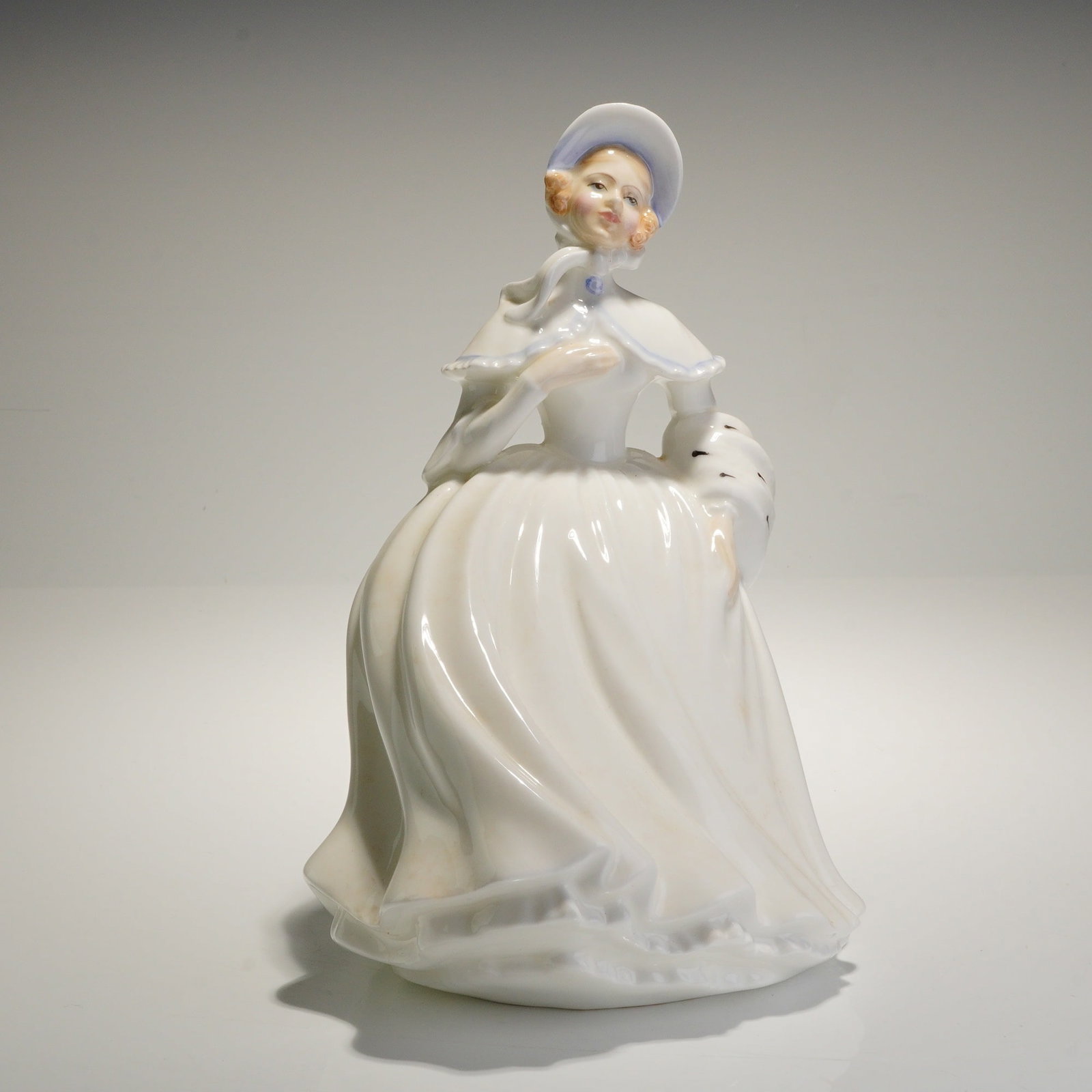 Royal Doulton Porcelain Figurine Jessica HN3497: A 1993 glazed porcelain figurine by Royal Doulton, titled "Jessica," model HN3497. The figure depicts a woman modeled in a traditional style, likely referencing the Victorian or Edwardian period. She 