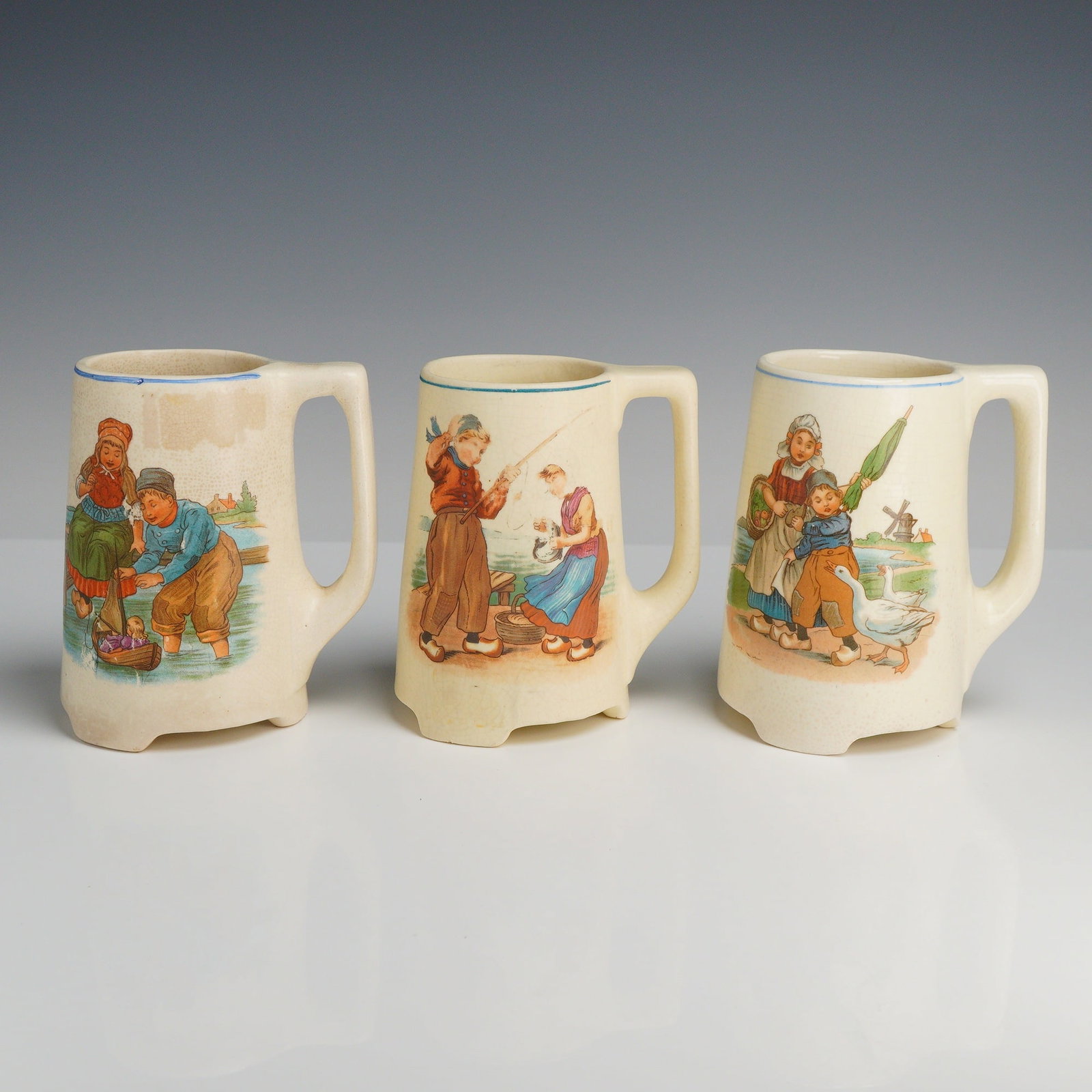 Roseville Pottery Creamware Dutch Children Mugs, Set of Three (1 of 3)