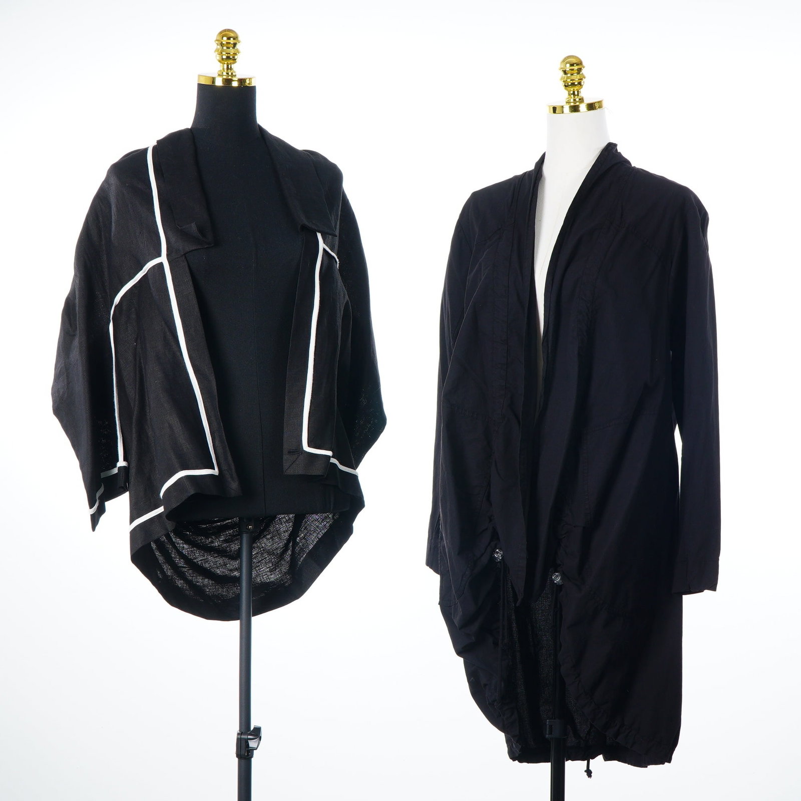 Two Contemporary Designer Jackets by Yuvita and Prairie Underground: This lot features two contemporary designer jackets. The first is a Yuvita kimono jacket constructed from black 100 percent linen. It features an open-front design with wide sleeves and contrasting wh