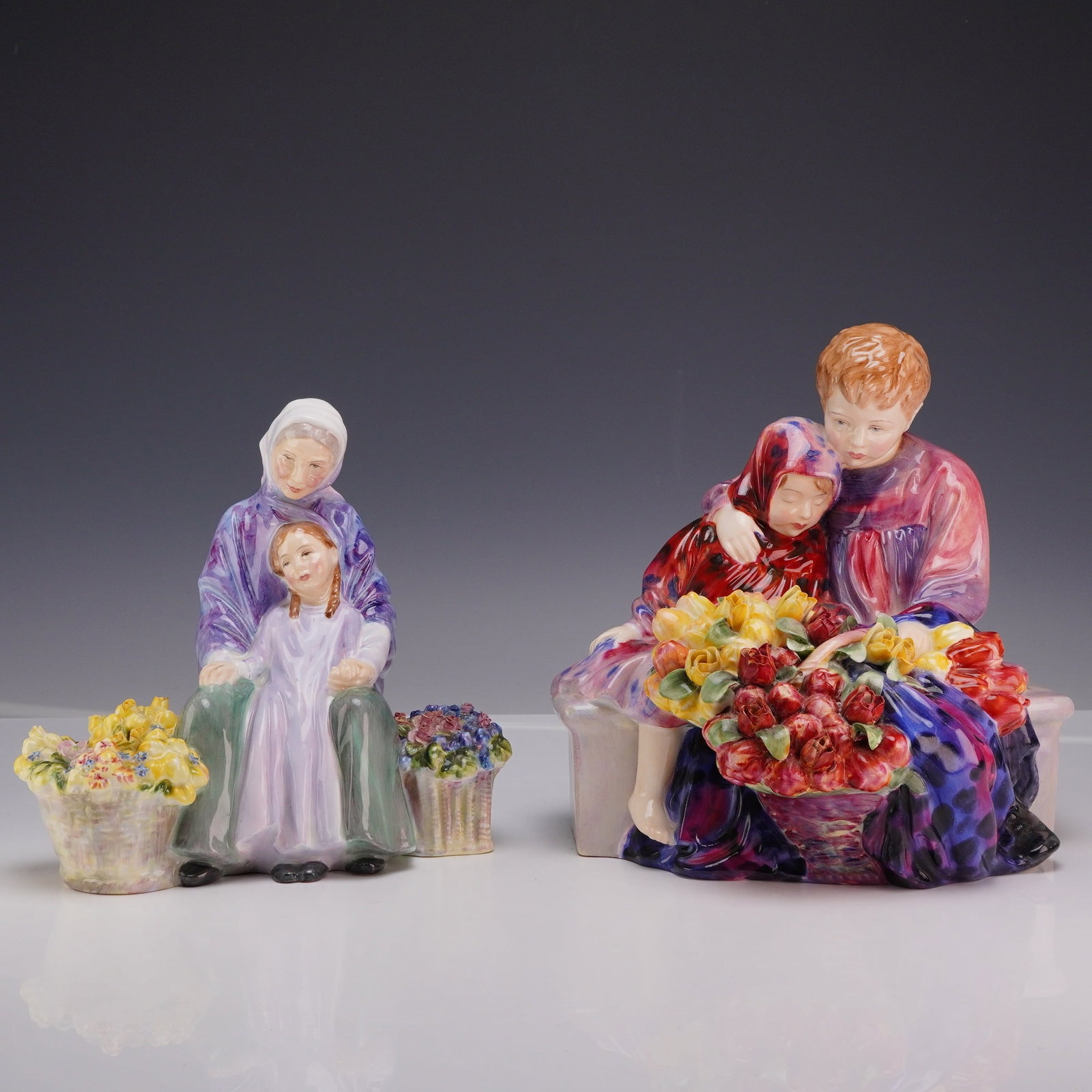 A Lot of Two Royal Doulton Porcelain Figurines, Granny's Heritage HN 2031 and Flower Seller's (1 of 3)