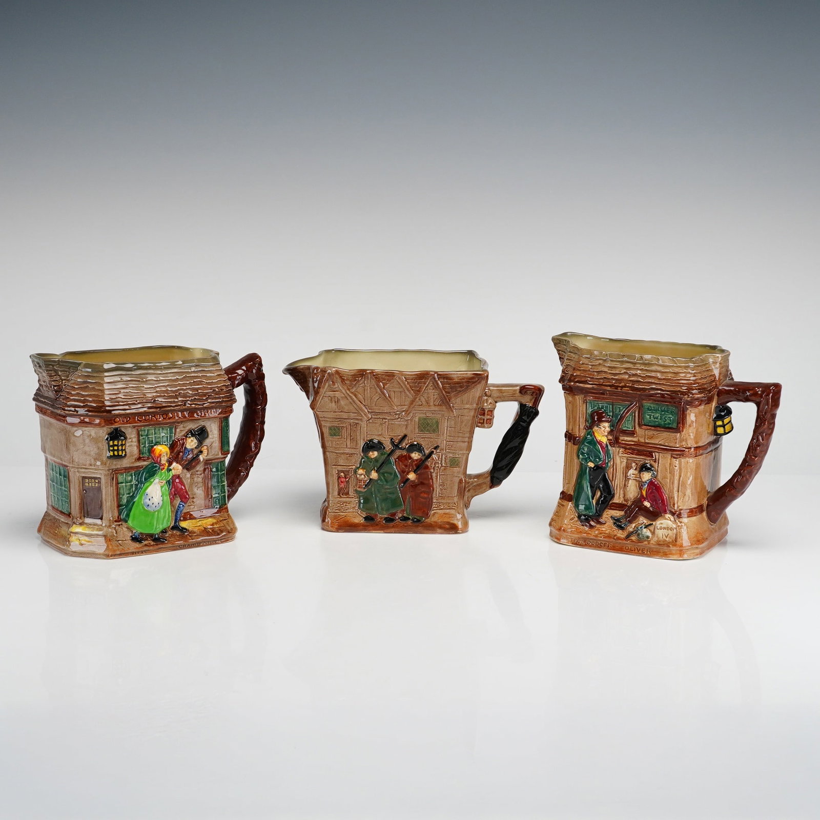 3pc Royal Doulton Dickensware and Seriesware Relief-Molded Earthenware Pitchers (1 of 3)