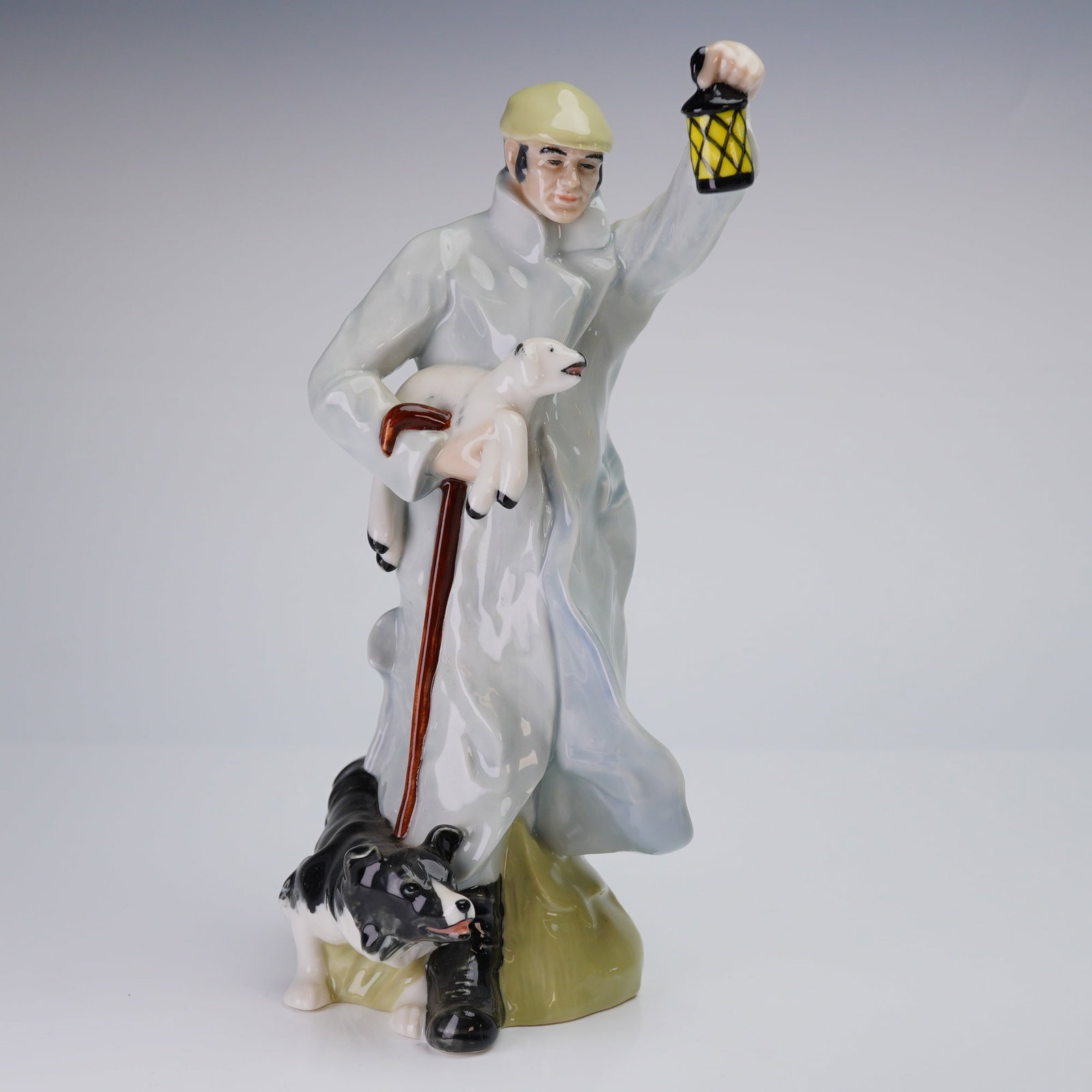 Royal Doulton Reflections Figurine, Shepherd HN3160: The piece captures a pastoral scene with a serene and contemplative figure, rendered in Royal Doulton's signature style with exceptional attention to detail and soft, naturalistic coloration. The figu