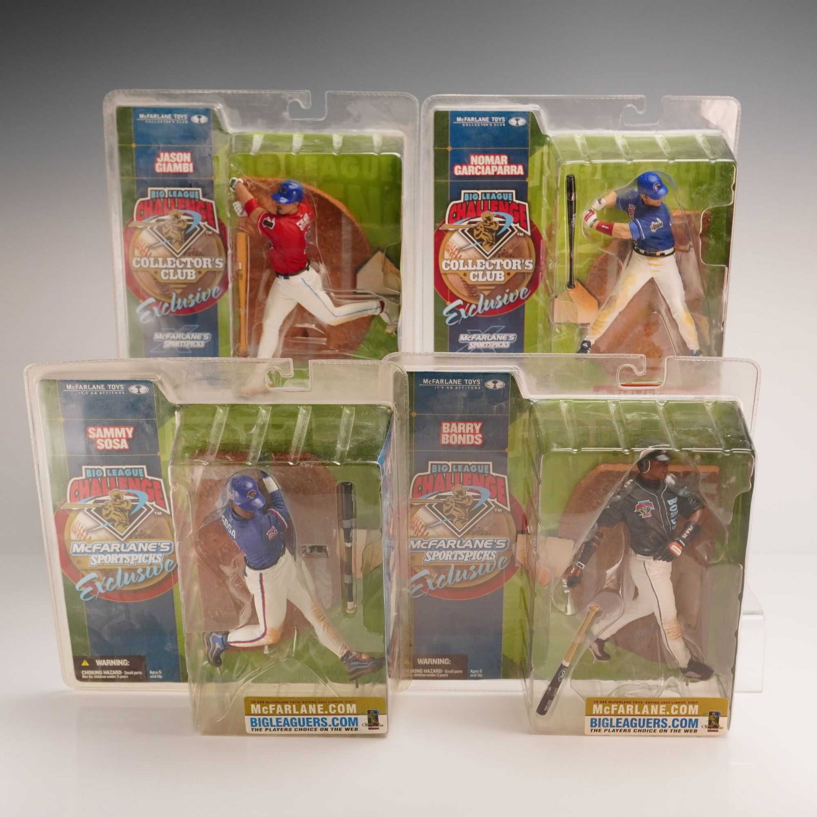 4pc McFarlane's Sportspick Big League Challenge Action Figures Featuring Giambi, Garciaparra, Sosa,: A collection of four McFarlane Toys Sportspicks action figures from the Big League Challenge series, released in 2002 as Collector's Club Exclusives. Each figure represents a Major League Baseball pla