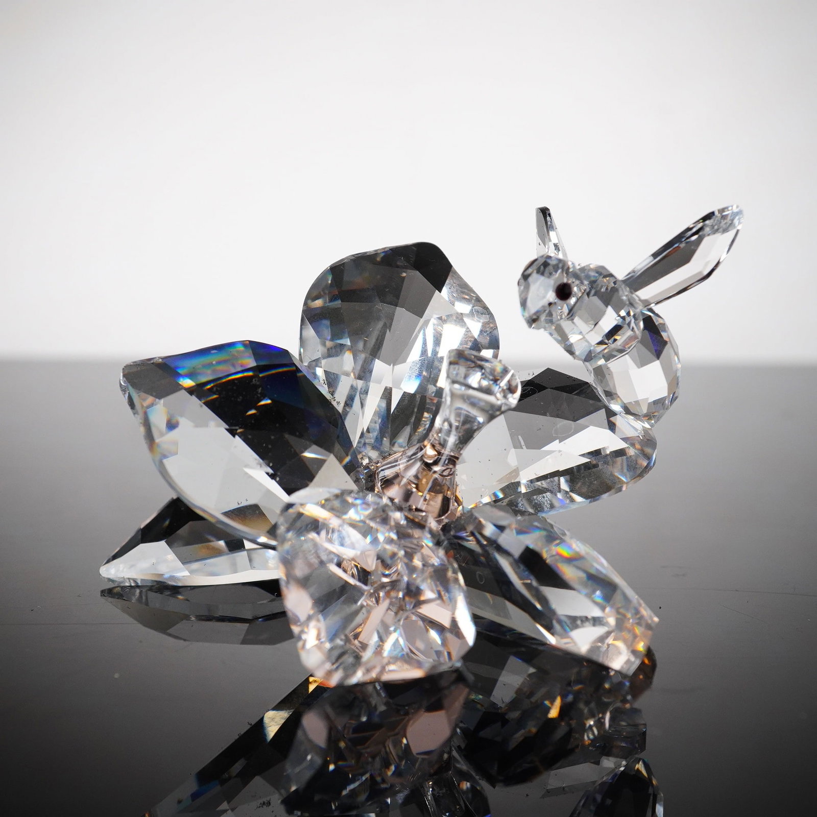 Swarovski Crystal Figurine, The Collector: This limited edition bee was designed by Anton Hirzinger and was made to celebrate the 20th anniversary of the SCS. Available during 2007 only, the bee is made from clear crystal and sits on a clear f
