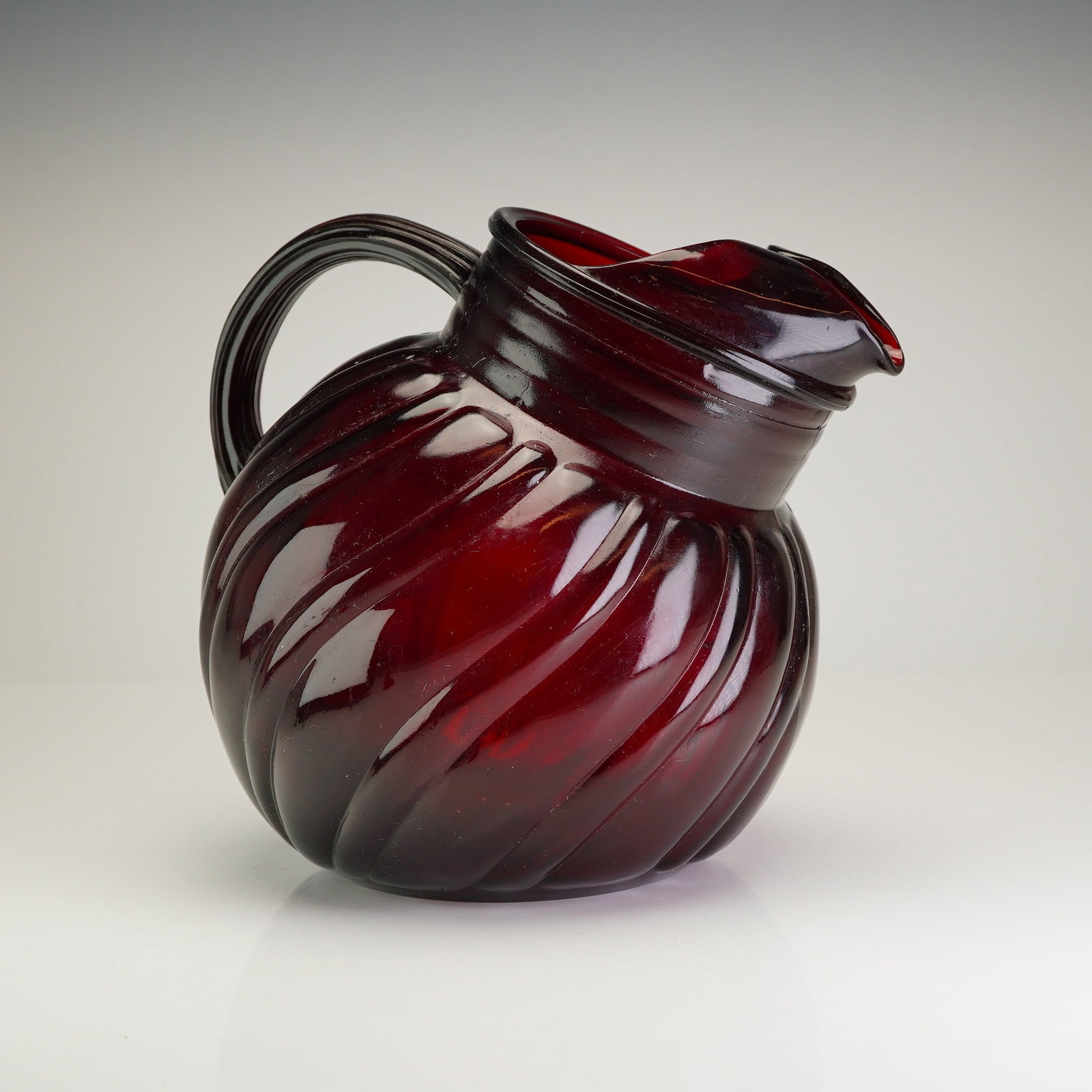 Anchor Hocking Royal Ruby Red Swirl Tilt Ball Pitcher, circa 1940 (1 of 3)