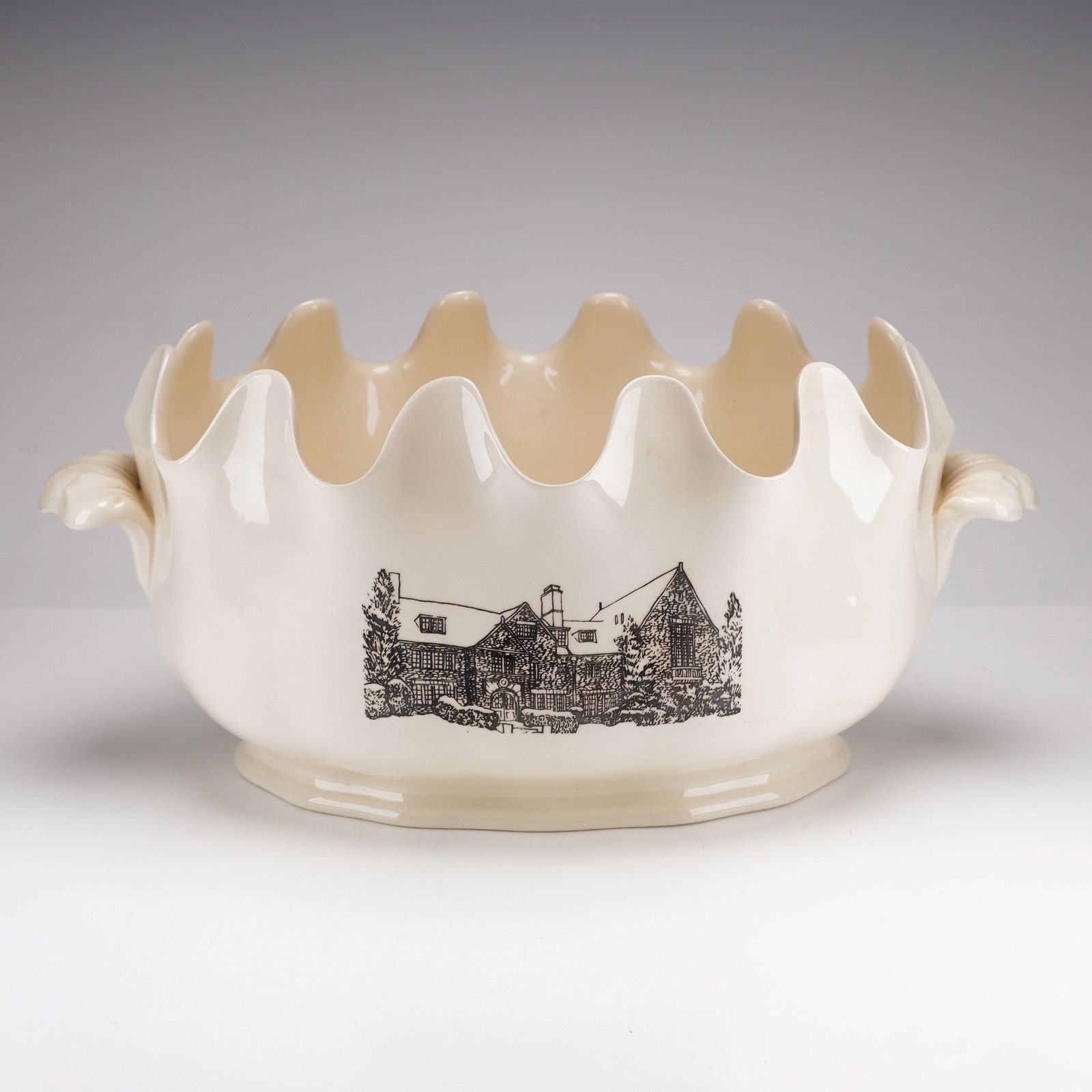 Wedgwood Creamware Monteith Commemorative Bowl for the 25th Anniversary of the Wedgwood Society: A Wedgwood creamware commemorative bowl produced for the 25th anniversary of the Wedgwood Society, specifically honoring the years 1951-1976. This Monteith-style vessel of oval form features a scallop